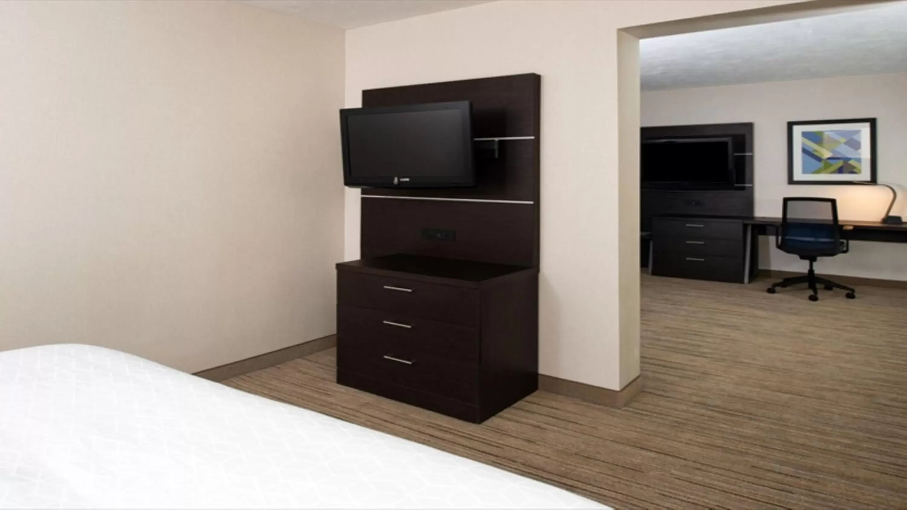 Photo of the whole room, TV/Entertainment Center in Holiday Inn Express Cincinnati West, an IHG Hotel