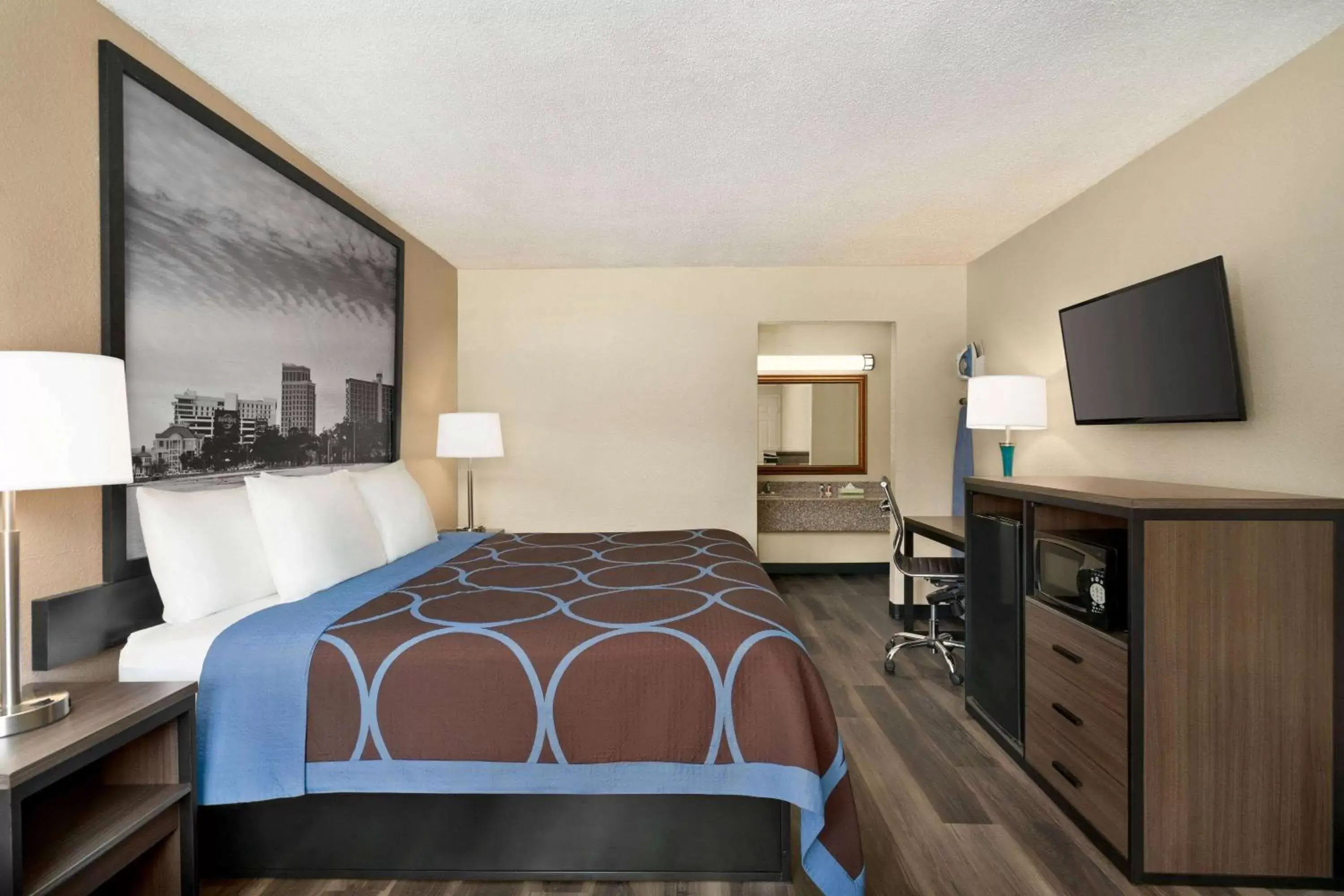 Bedroom, Bed in Super 8 by Wyndham Gulfport Near Biloxi