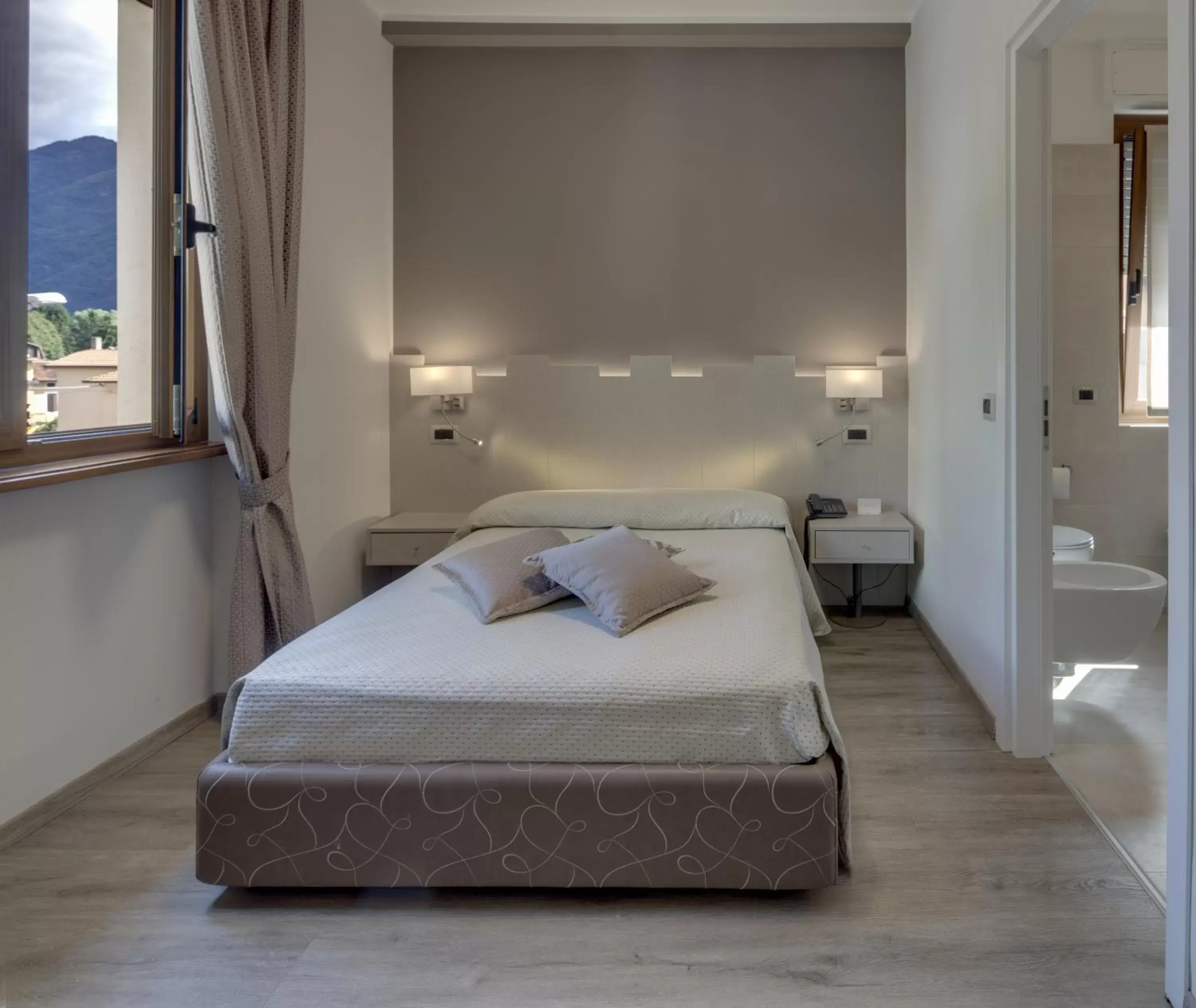 Bed in Albergo Milano