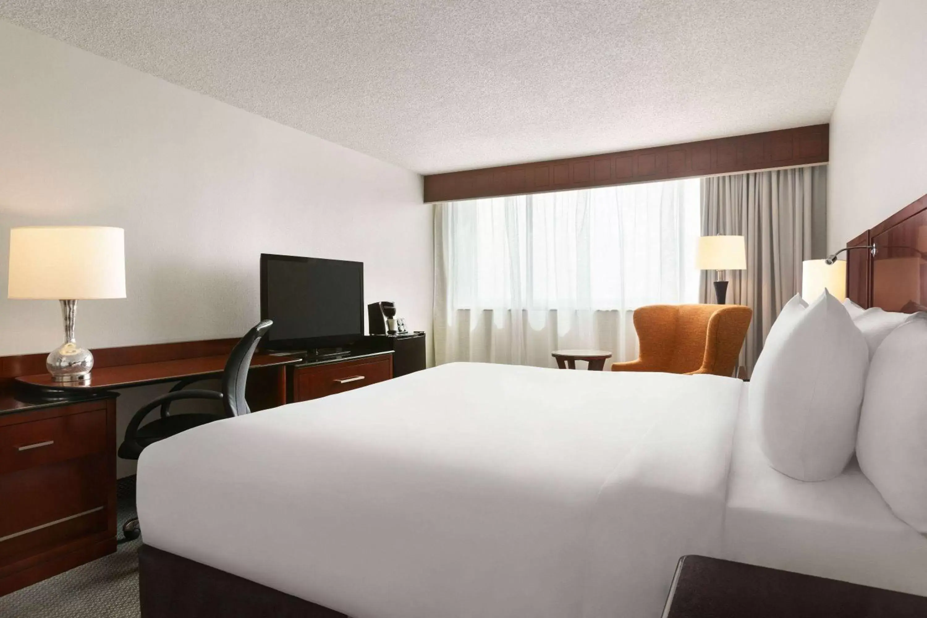 Photo of the whole room in Travelodge by Wyndham Quebec City Hotel & Convention Centre