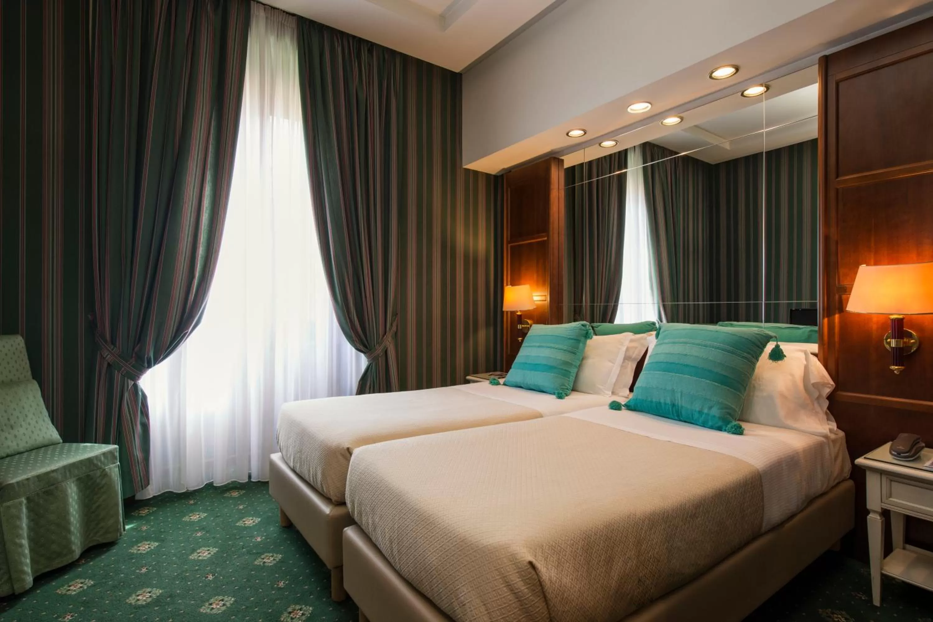 Bed in Atlante Garden Hotel
