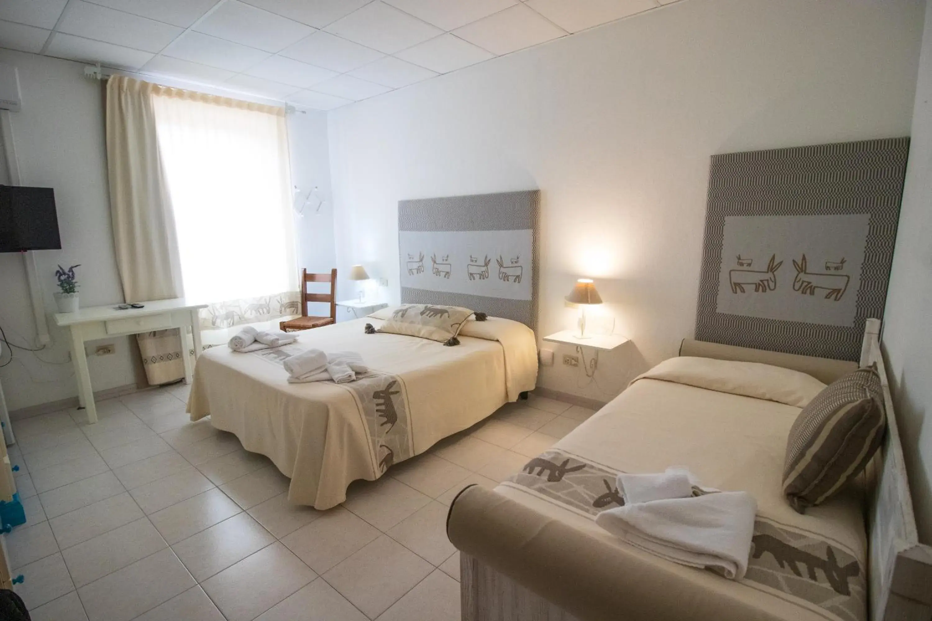 Bed in Hotel Canne al Vento