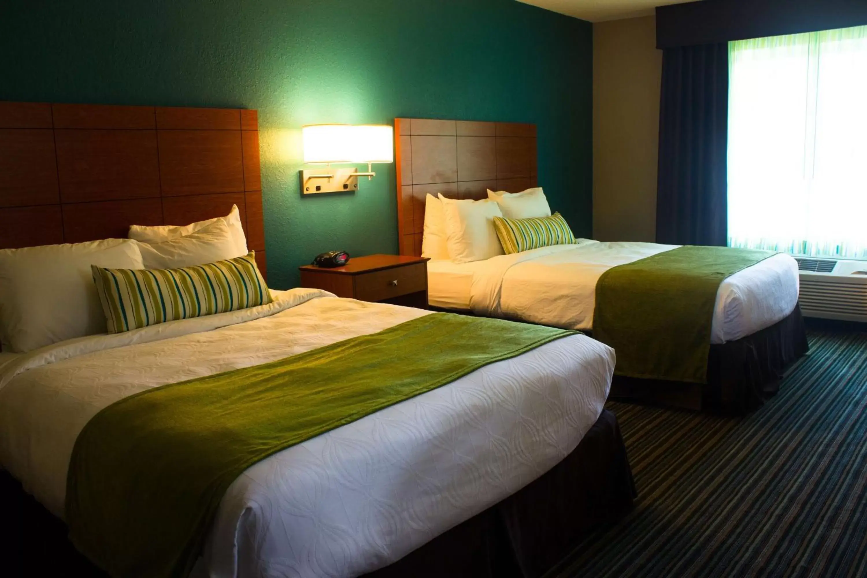 Photo of the whole room, Bed in BEST WESTERN Plus Menomonie Inn & Suites