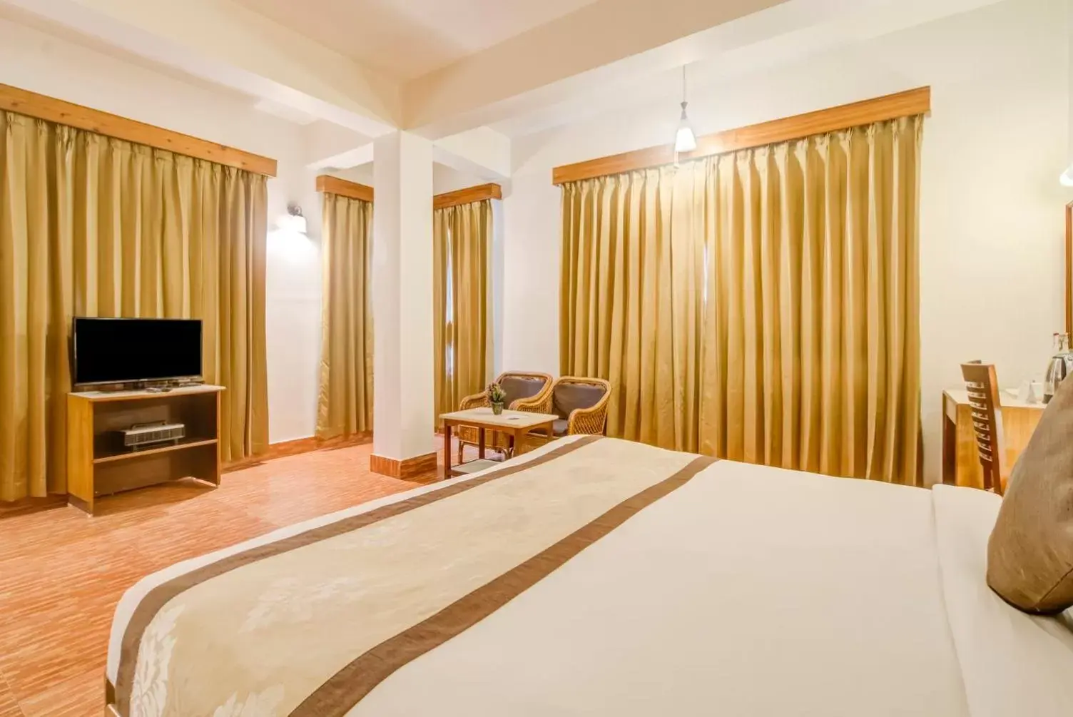 Bed in Summit Ttakshang Residency Hotel & Spa