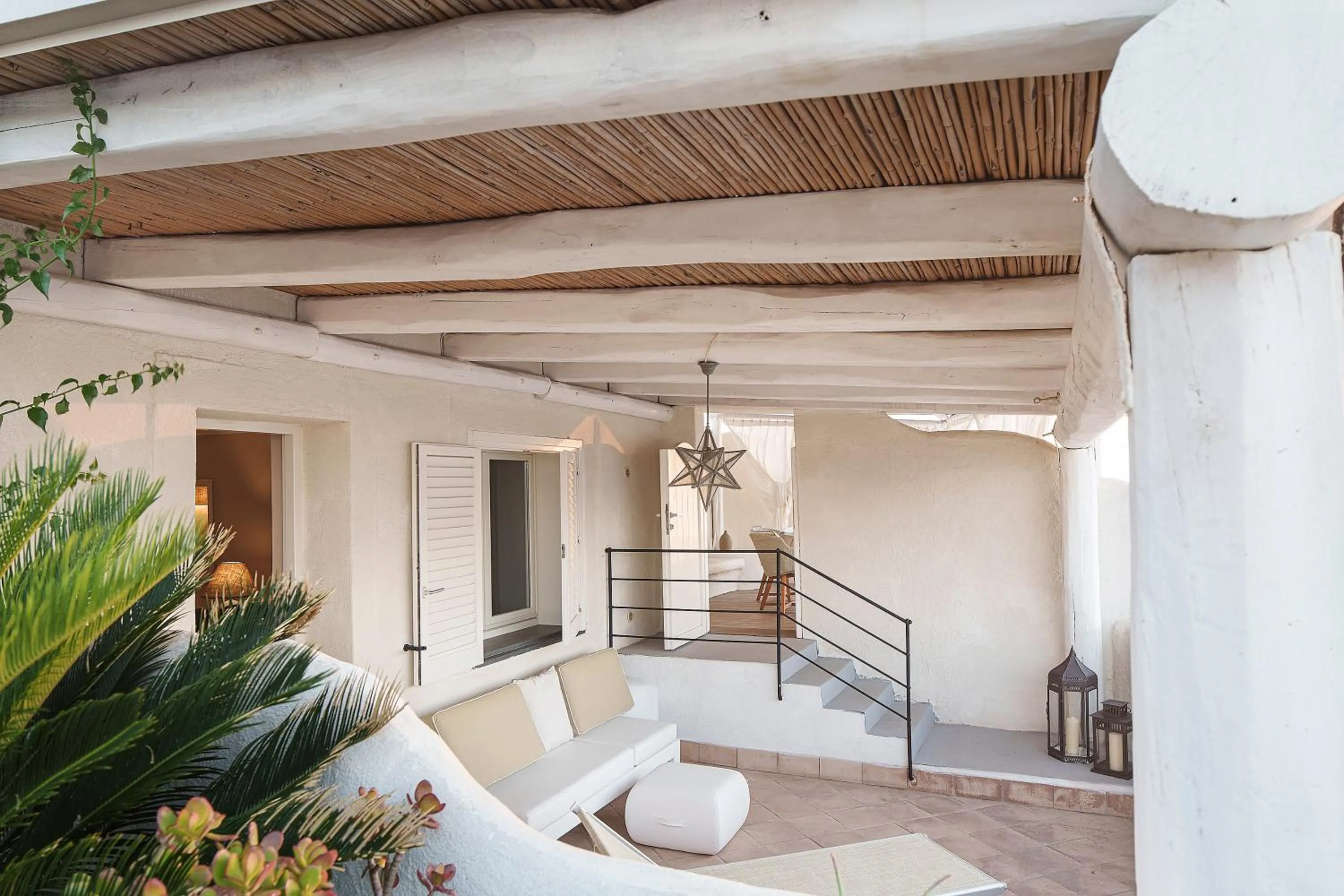 Patio in Therasia Resort Sea and SPA - The Leading Hotels of the World