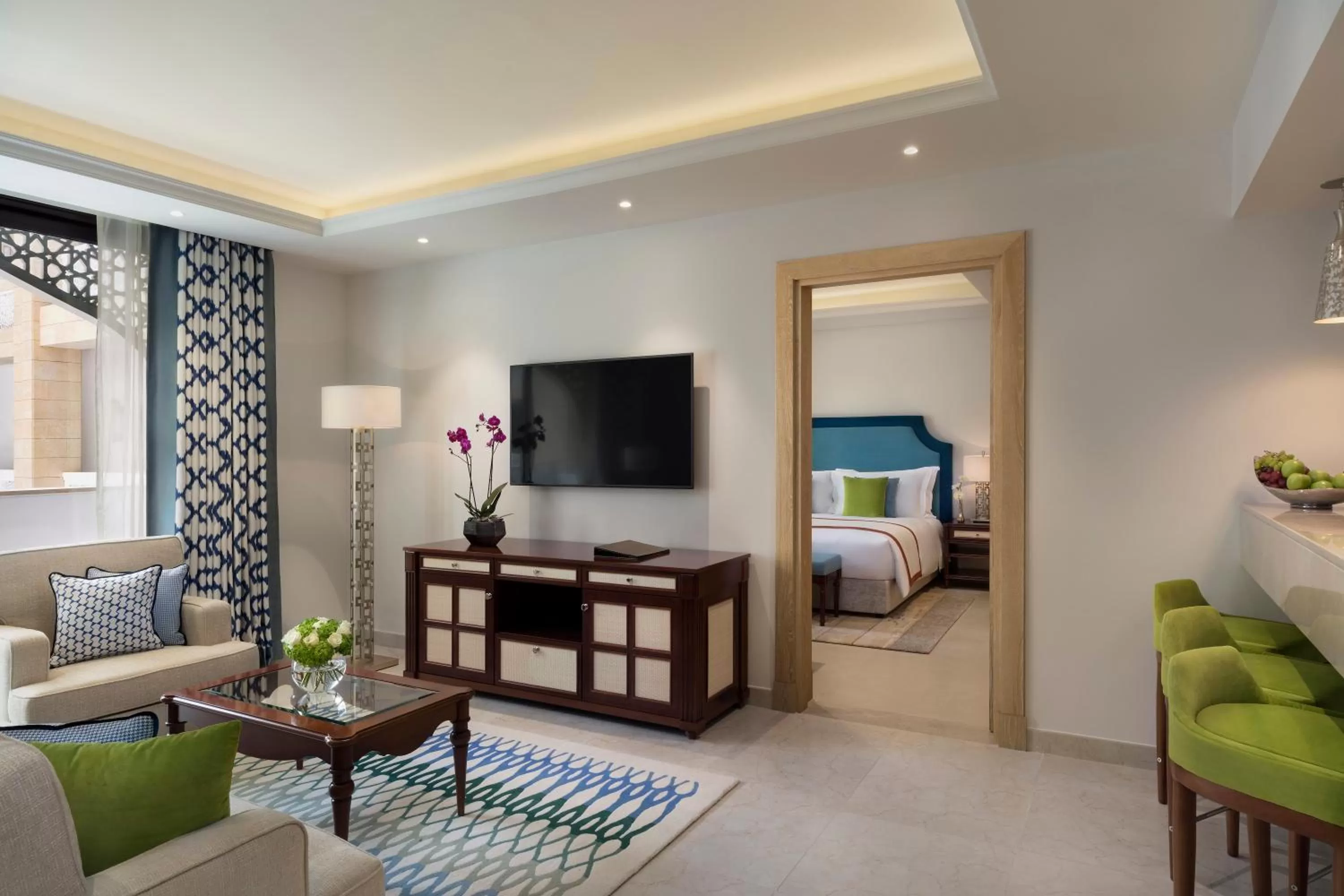 Communal lounge/ TV room, Bed in Al Najada Doha Hotel Apartments by Oaks