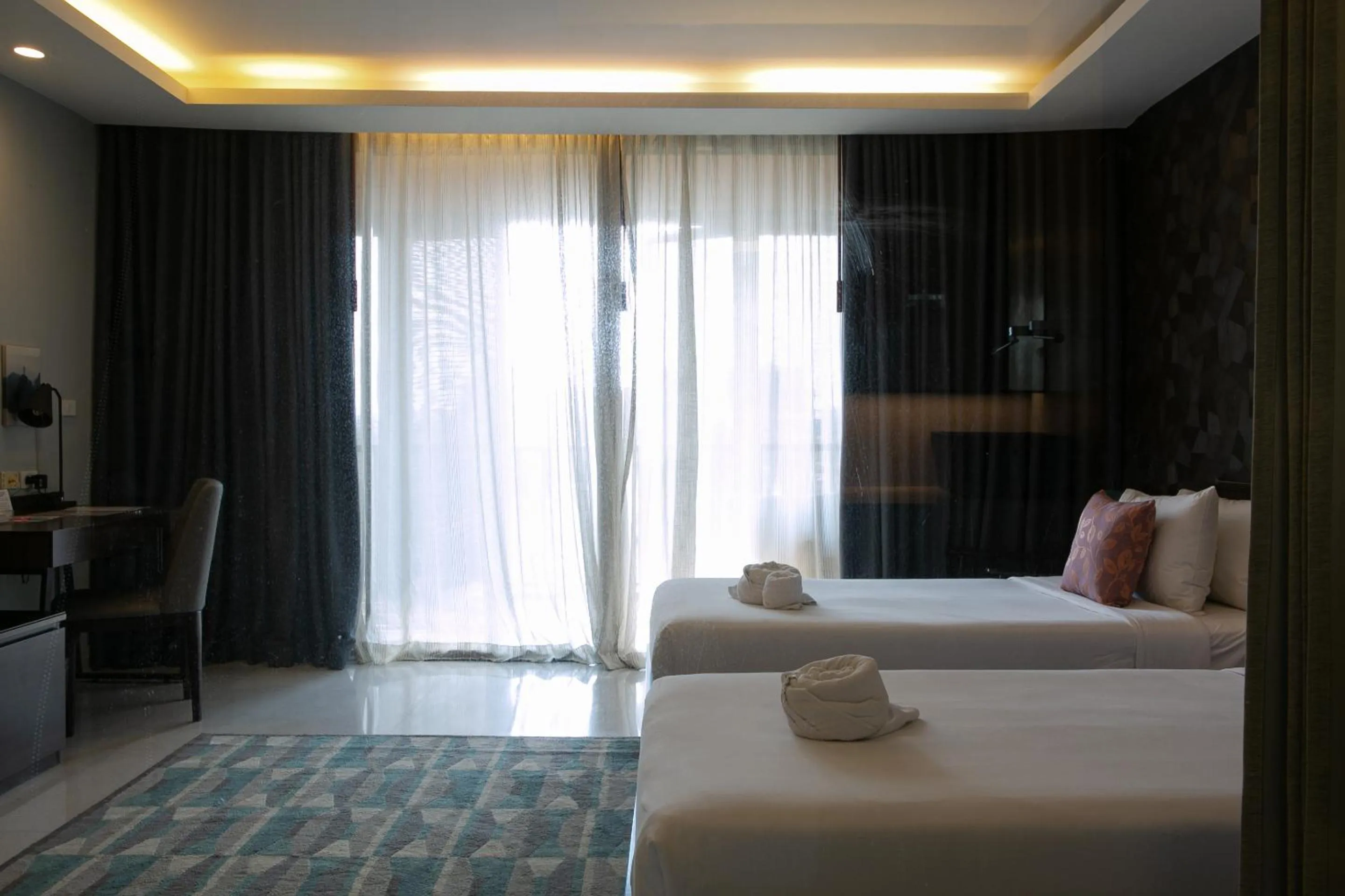 Bed in The Silver Palm Wellness Resort