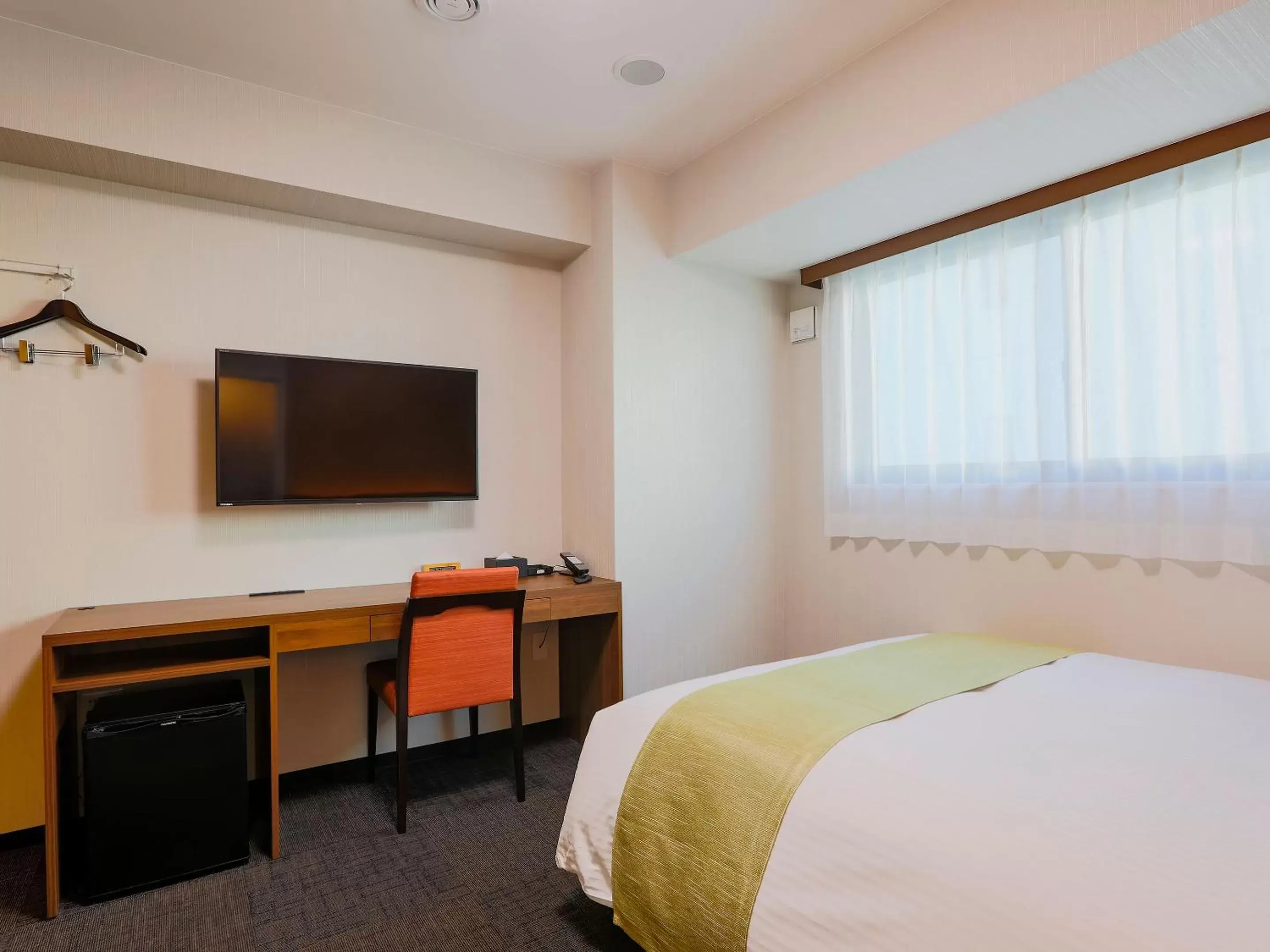 Photo of the whole room, TV/Entertainment Center in Hotel Wing International Takamatsu