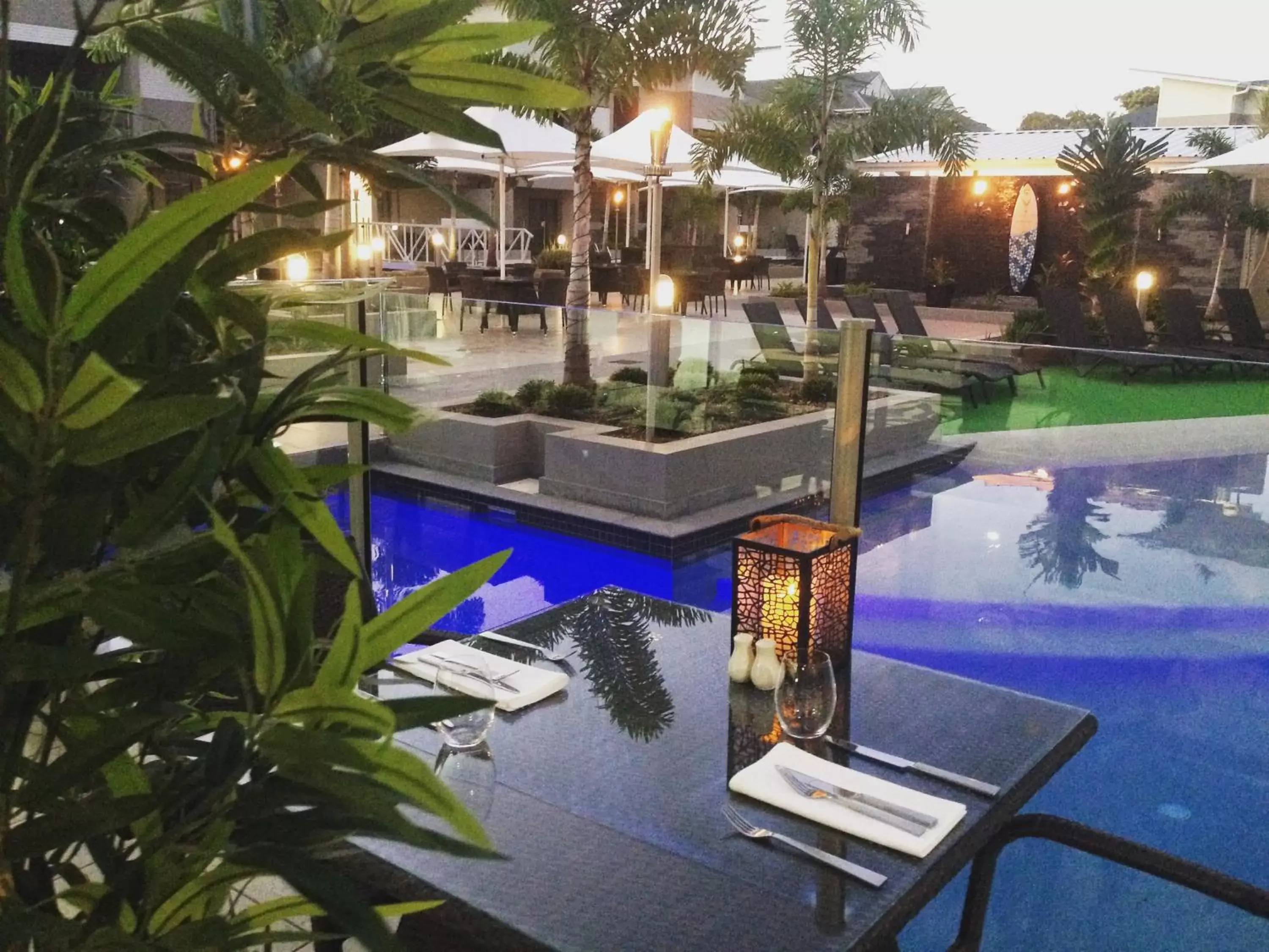 Dining area, Swimming Pool in 1770 Lagoons Central Apartment Resort