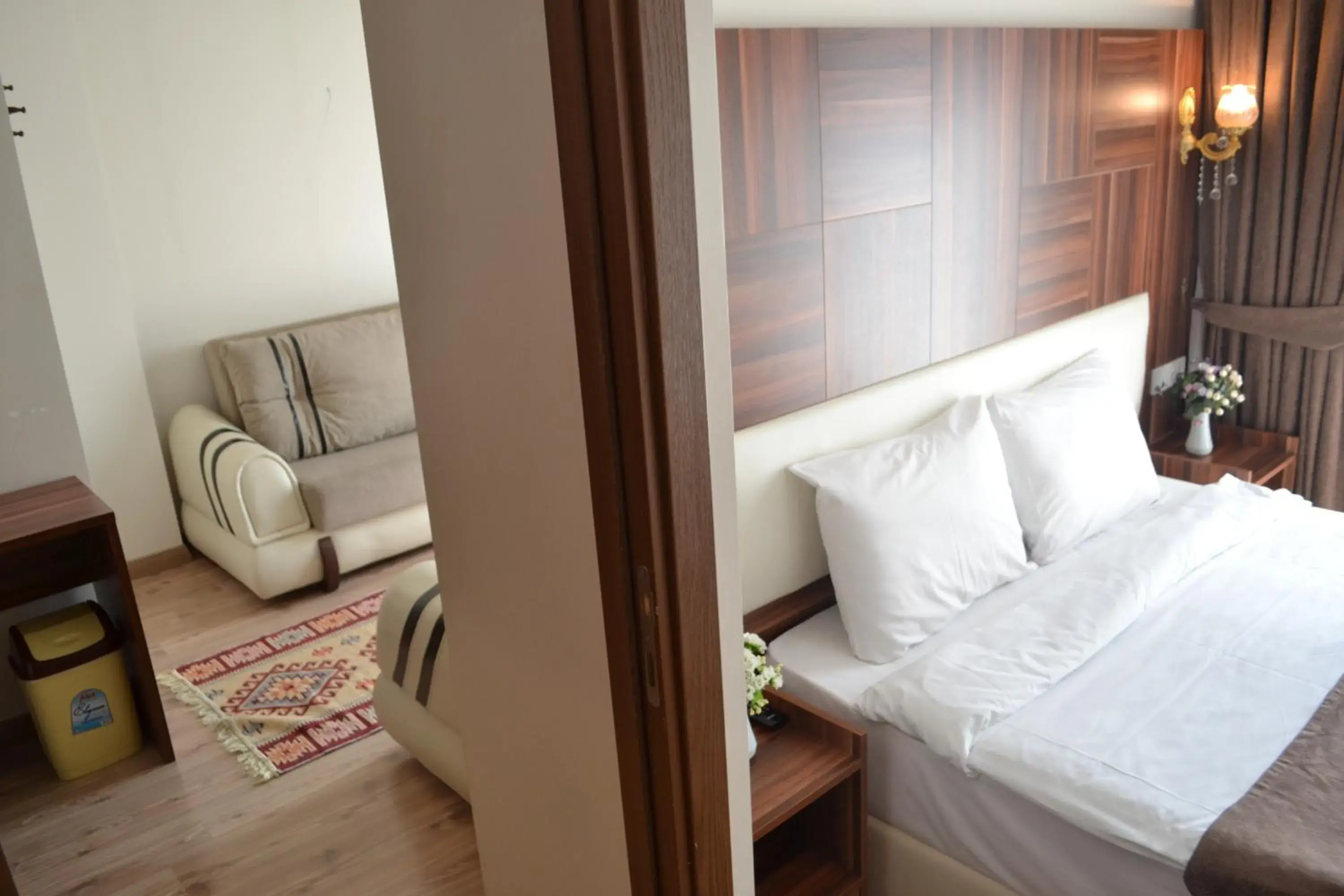 Living room, Bed in New Fatih Hotel