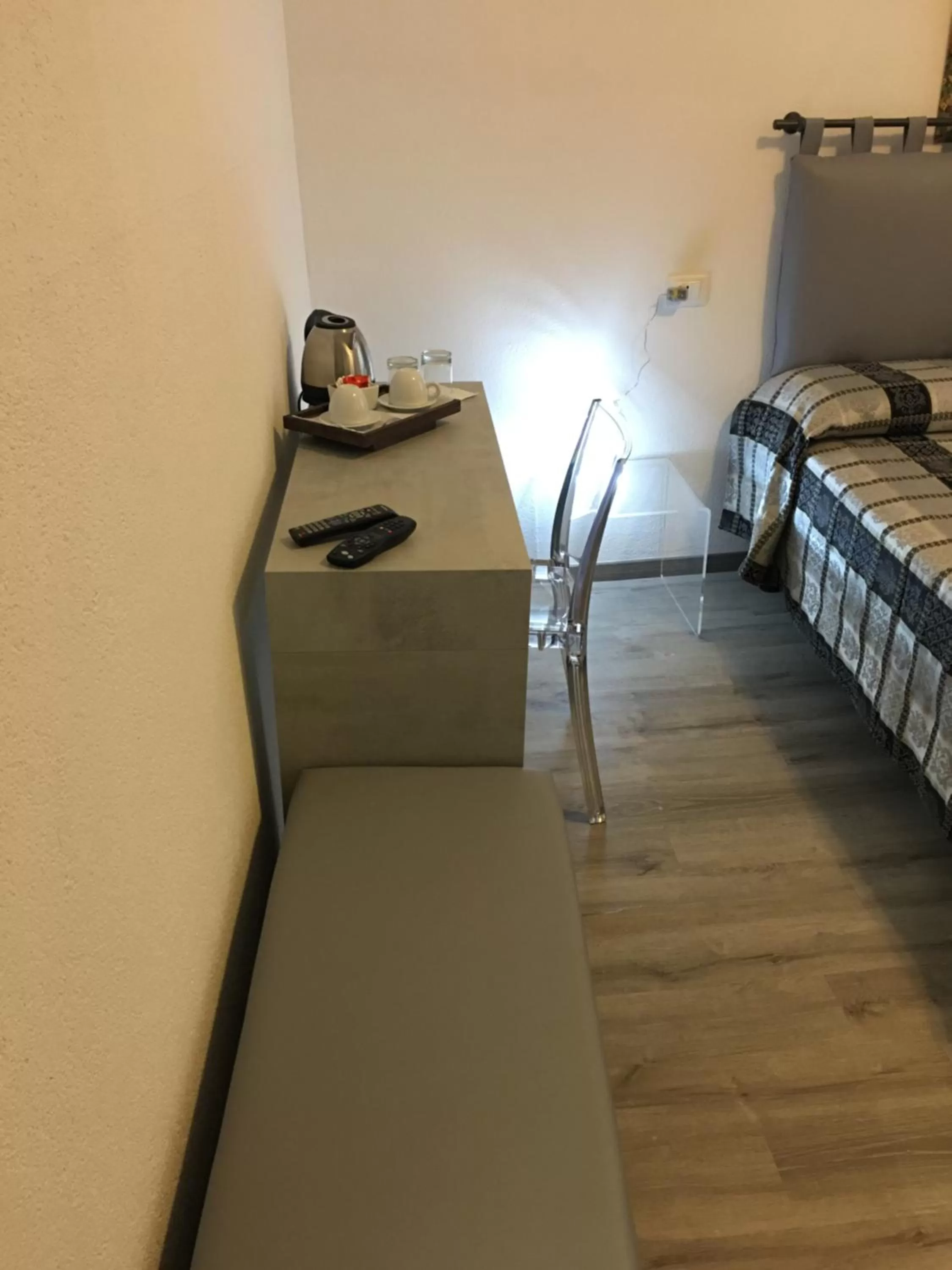 Seating area, Bed in Albergo Marin