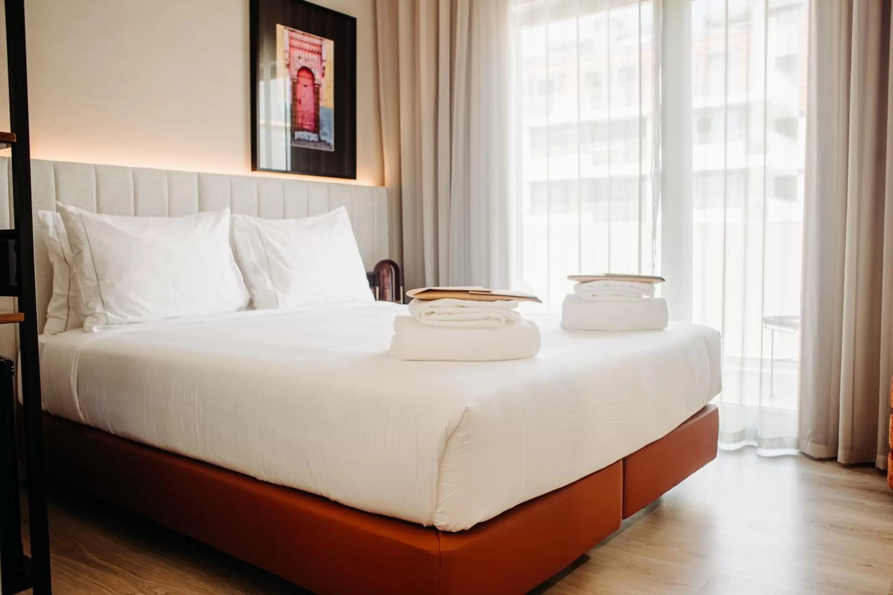 Bed in Next Level Premium Hotels