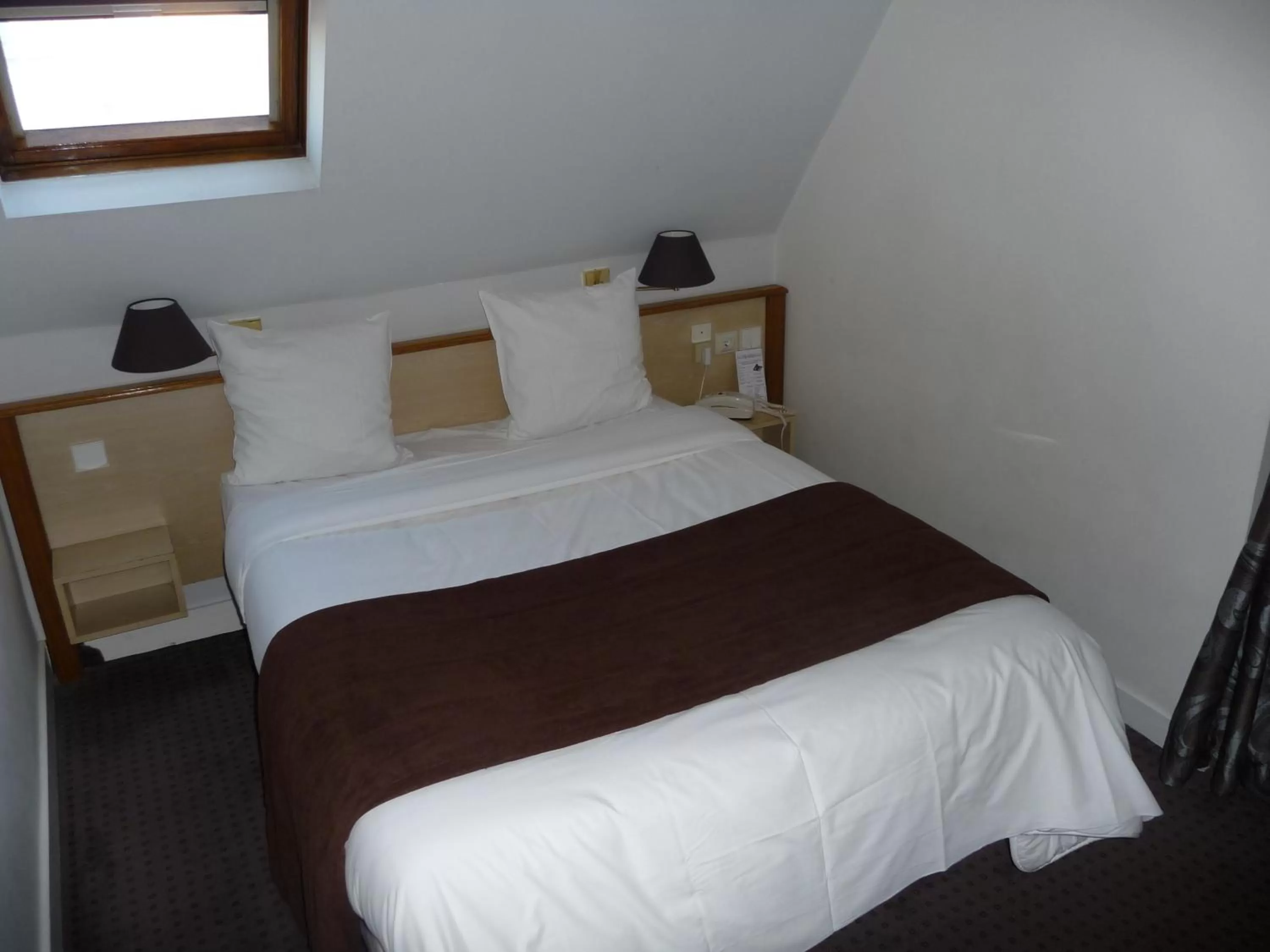 Bed in Hotel Corona -Rodier-