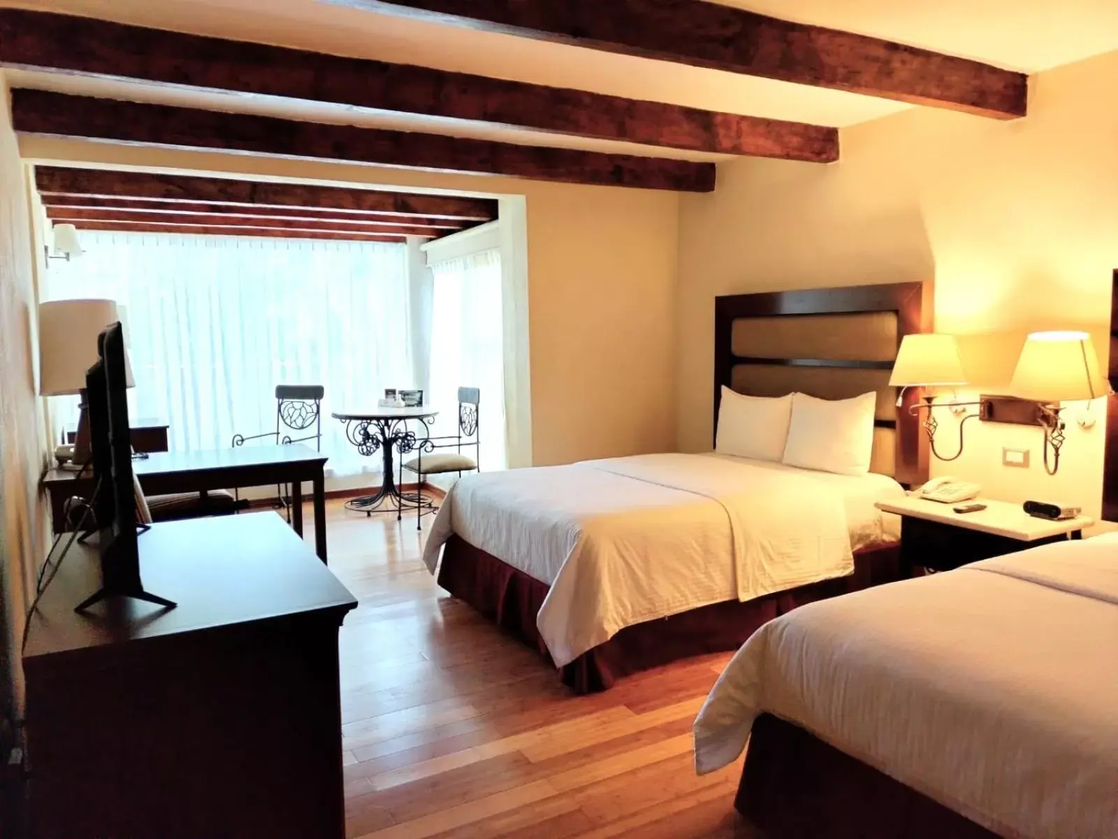 Bedroom in Hoteles Villa Mercedes San Cristobal