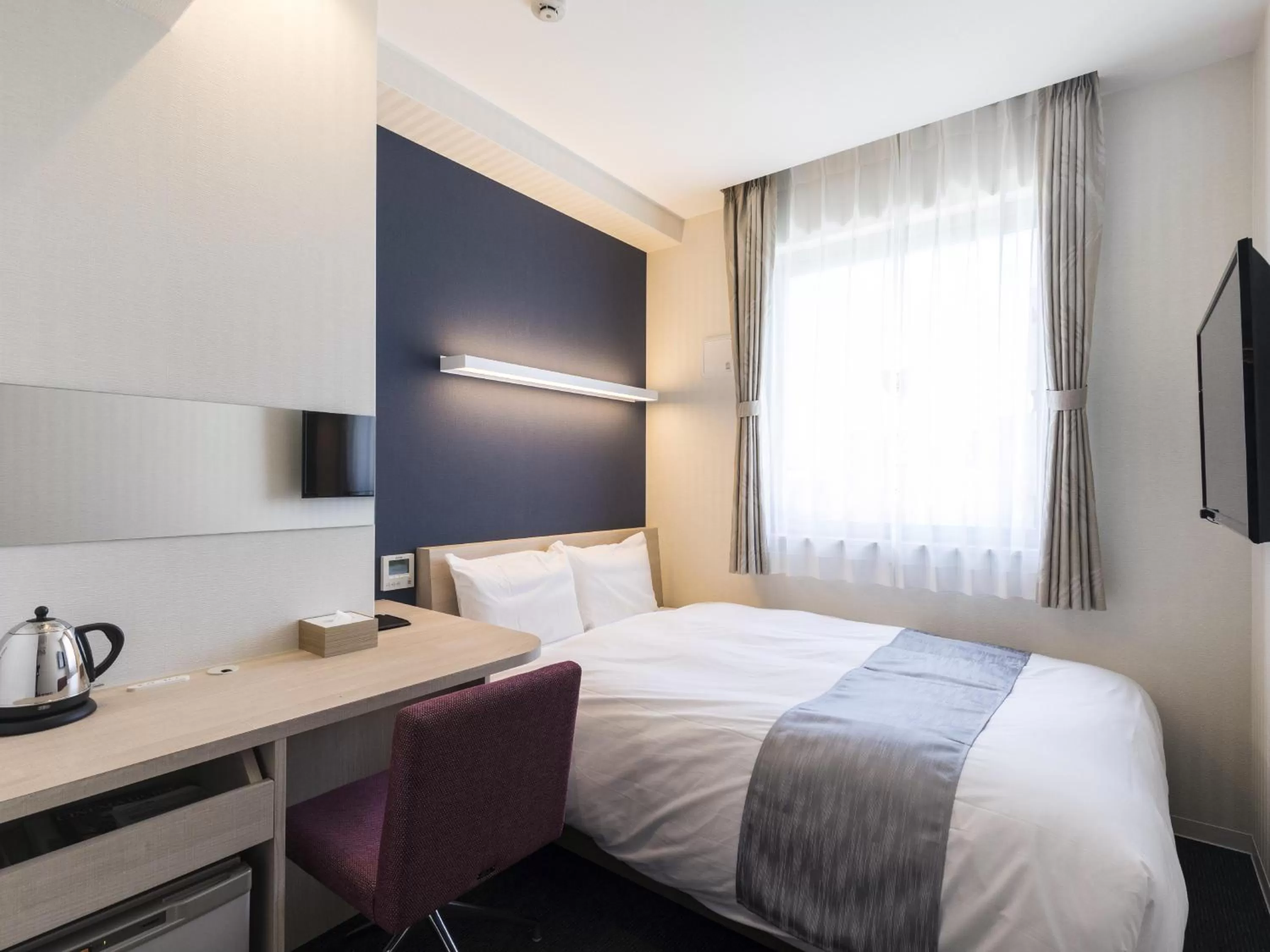 Photo of the whole room, Bed in Hotel Wing International Hakata Shinkansenguchi