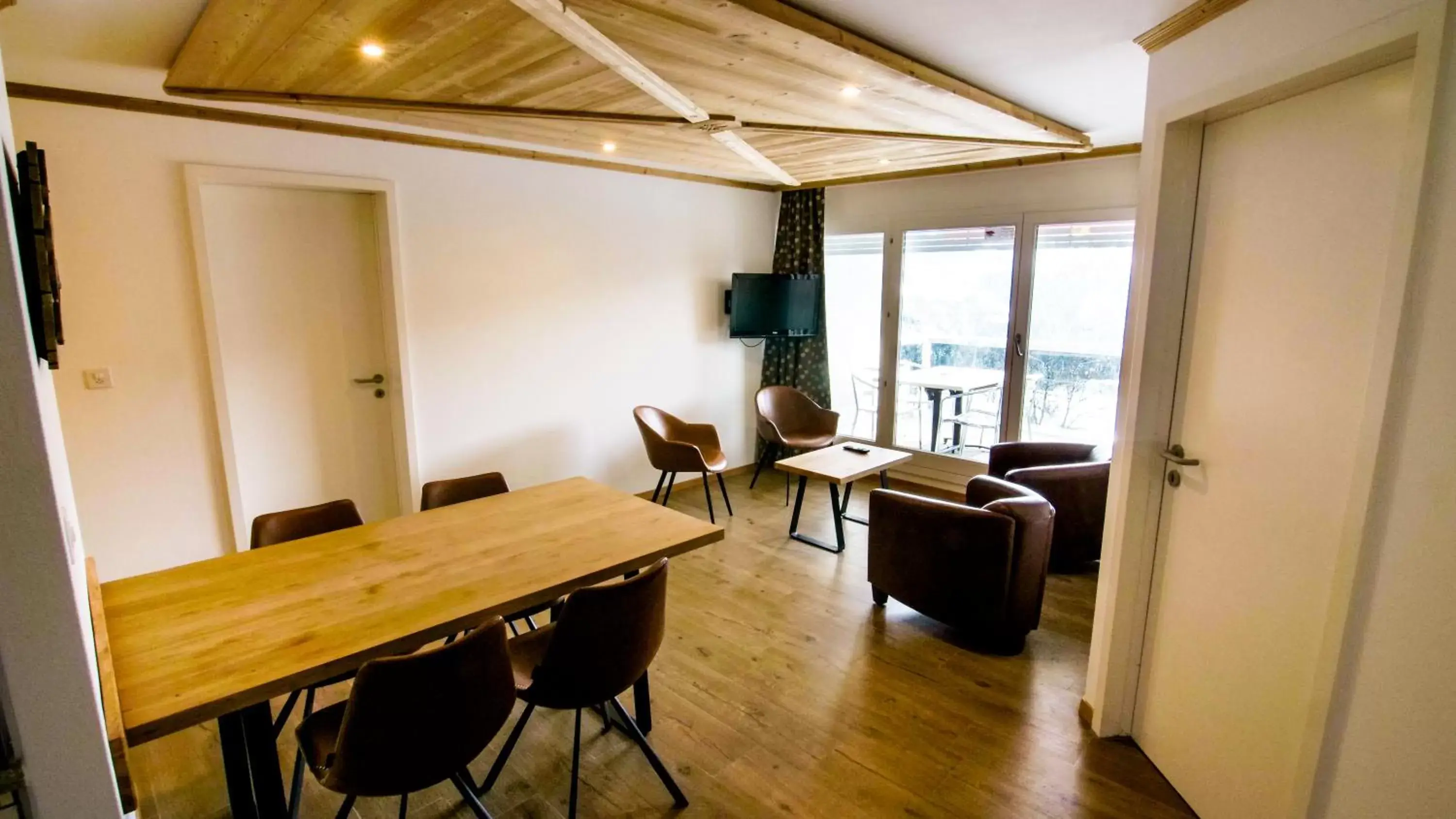 Living room, Dining Area in Hotel Central Résidence