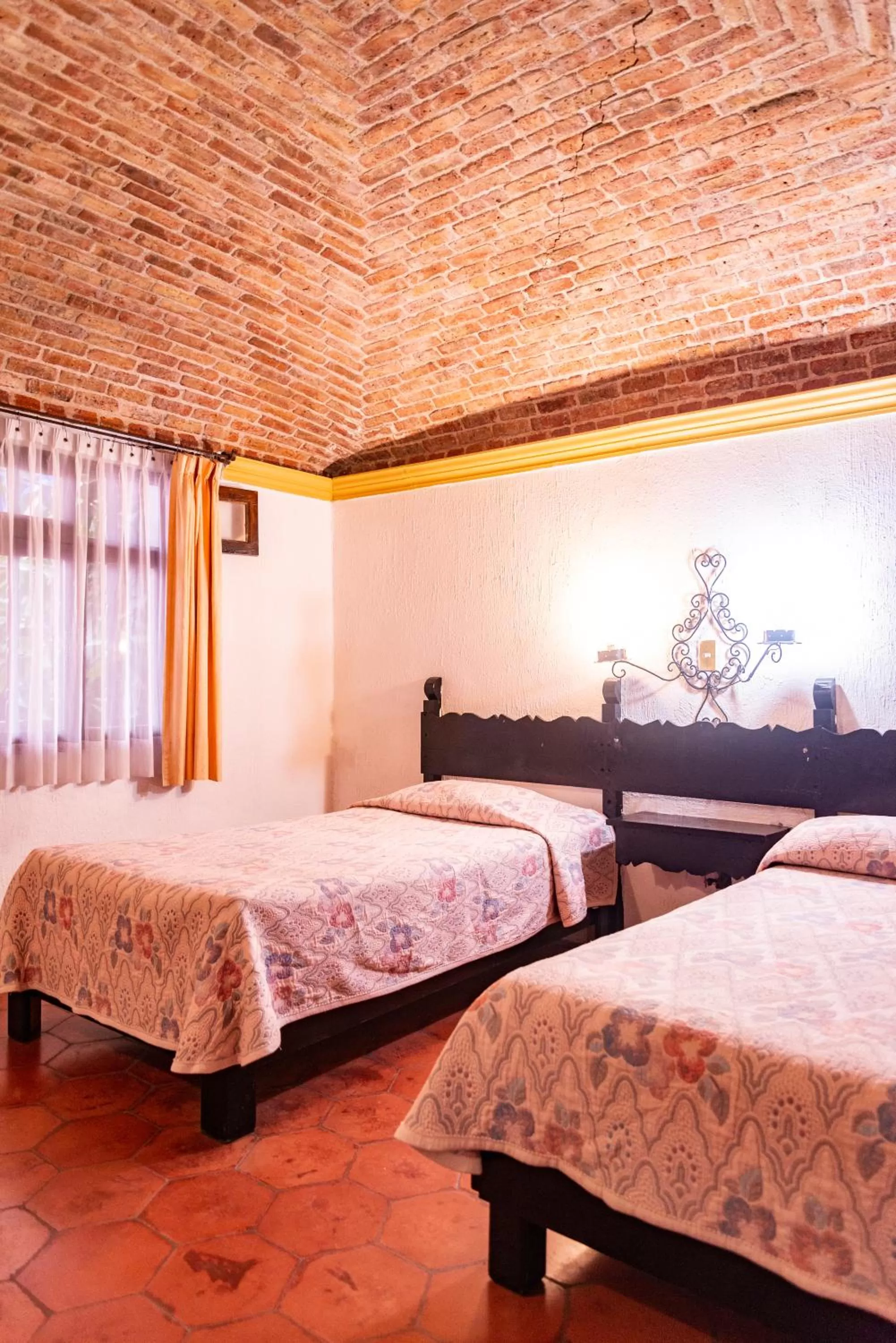 Bed in Hotel Hacienda de Cobos