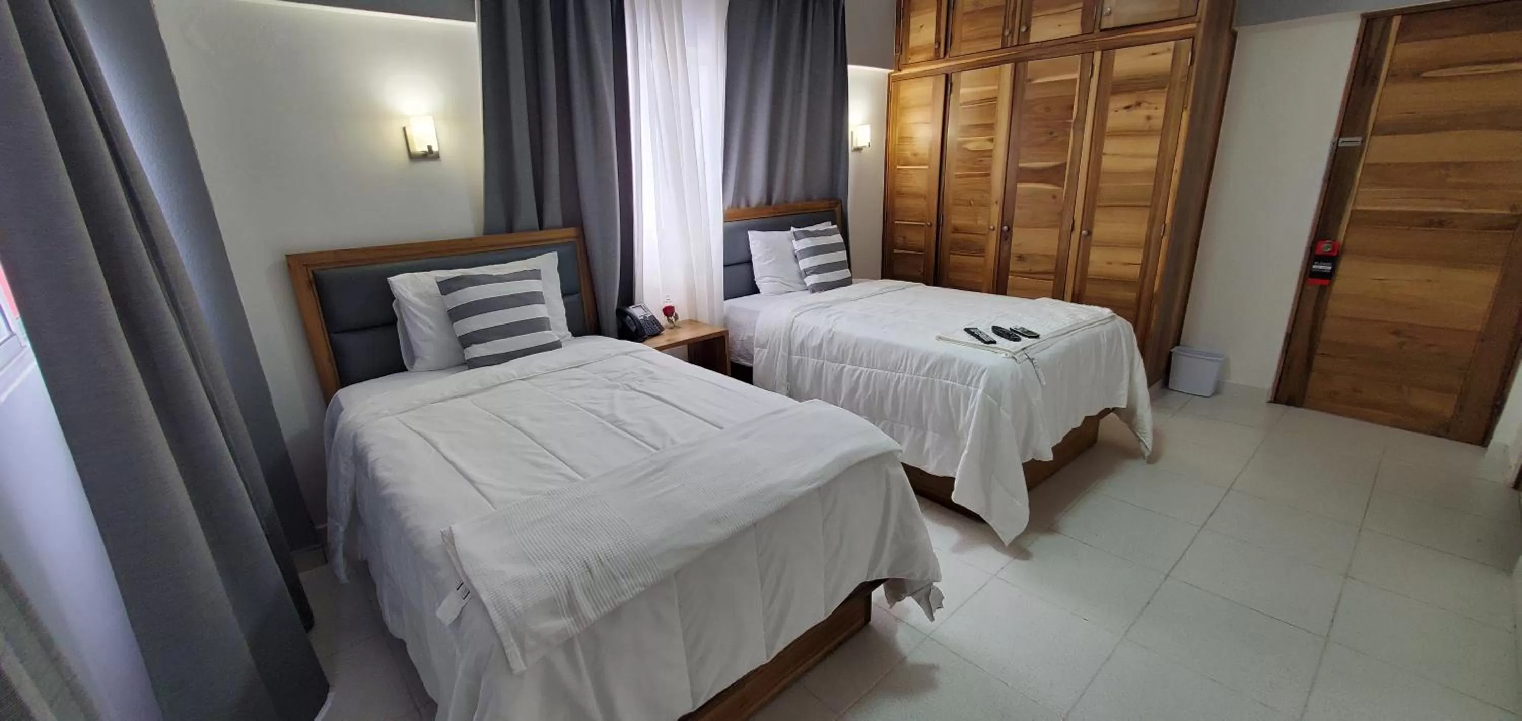 Bed in Boca Grande Hotel Suites