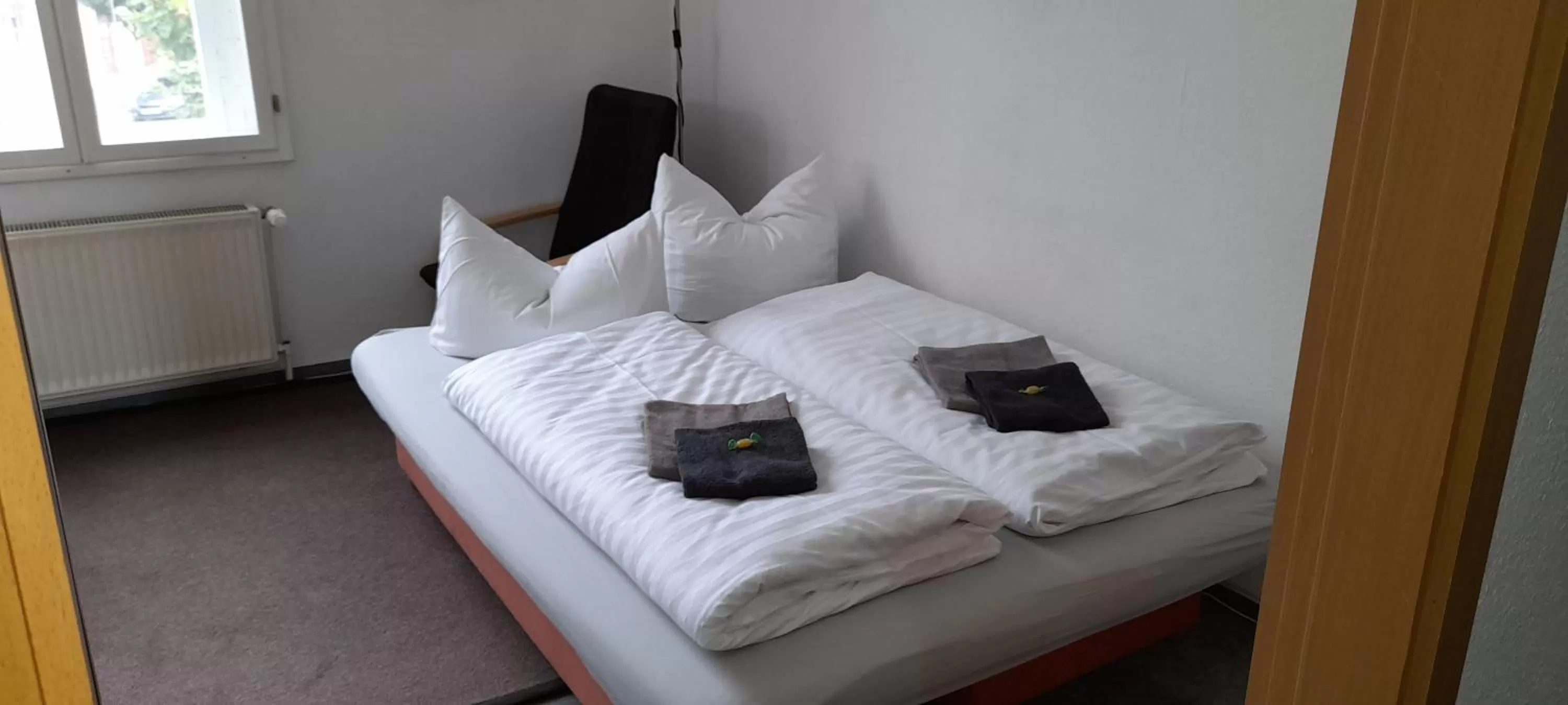 Bed in Apartment-Hotel Schillerplatz
