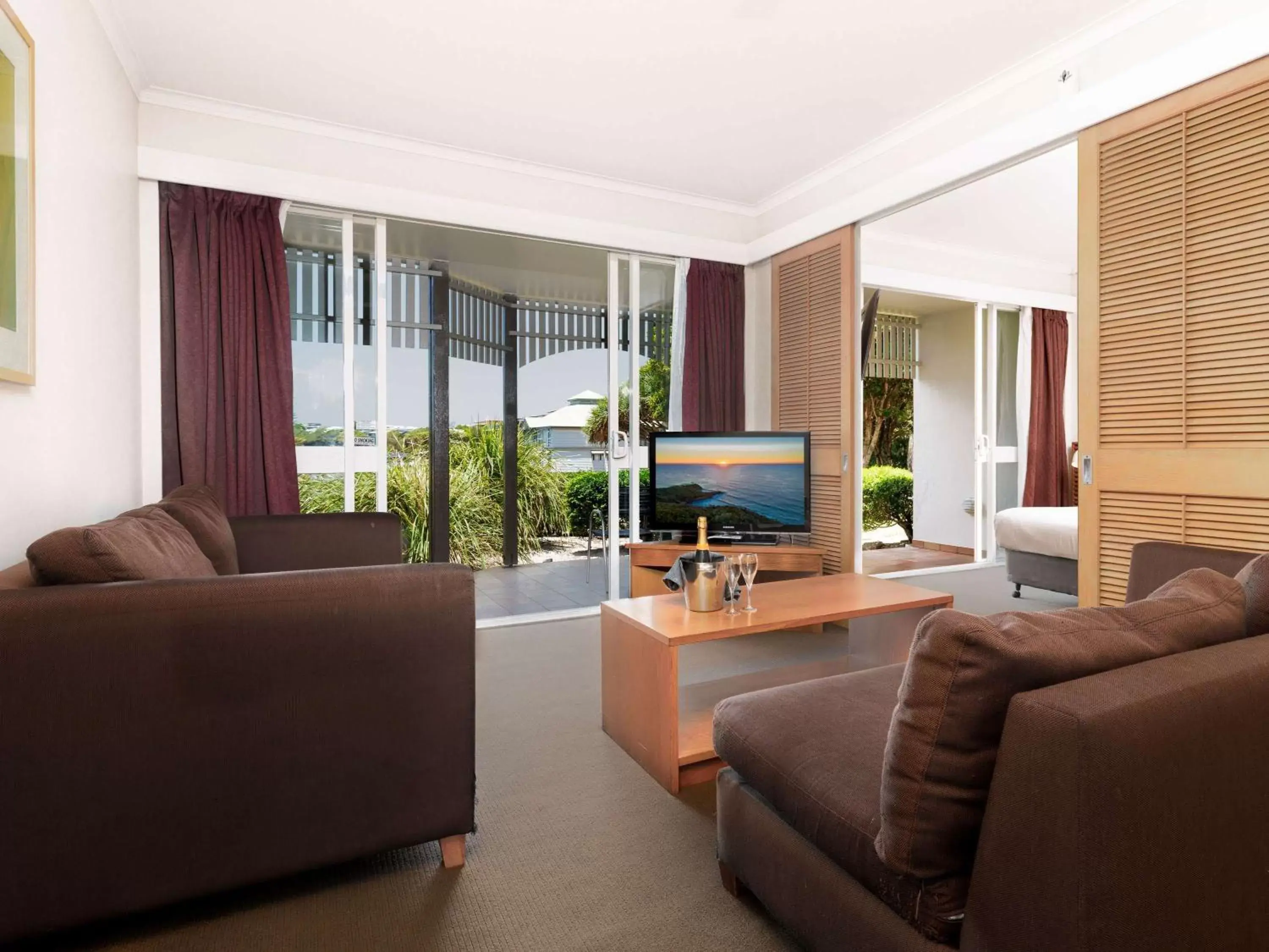 Bedroom, Seating Area in Novotel Sunshine Coast Resort
