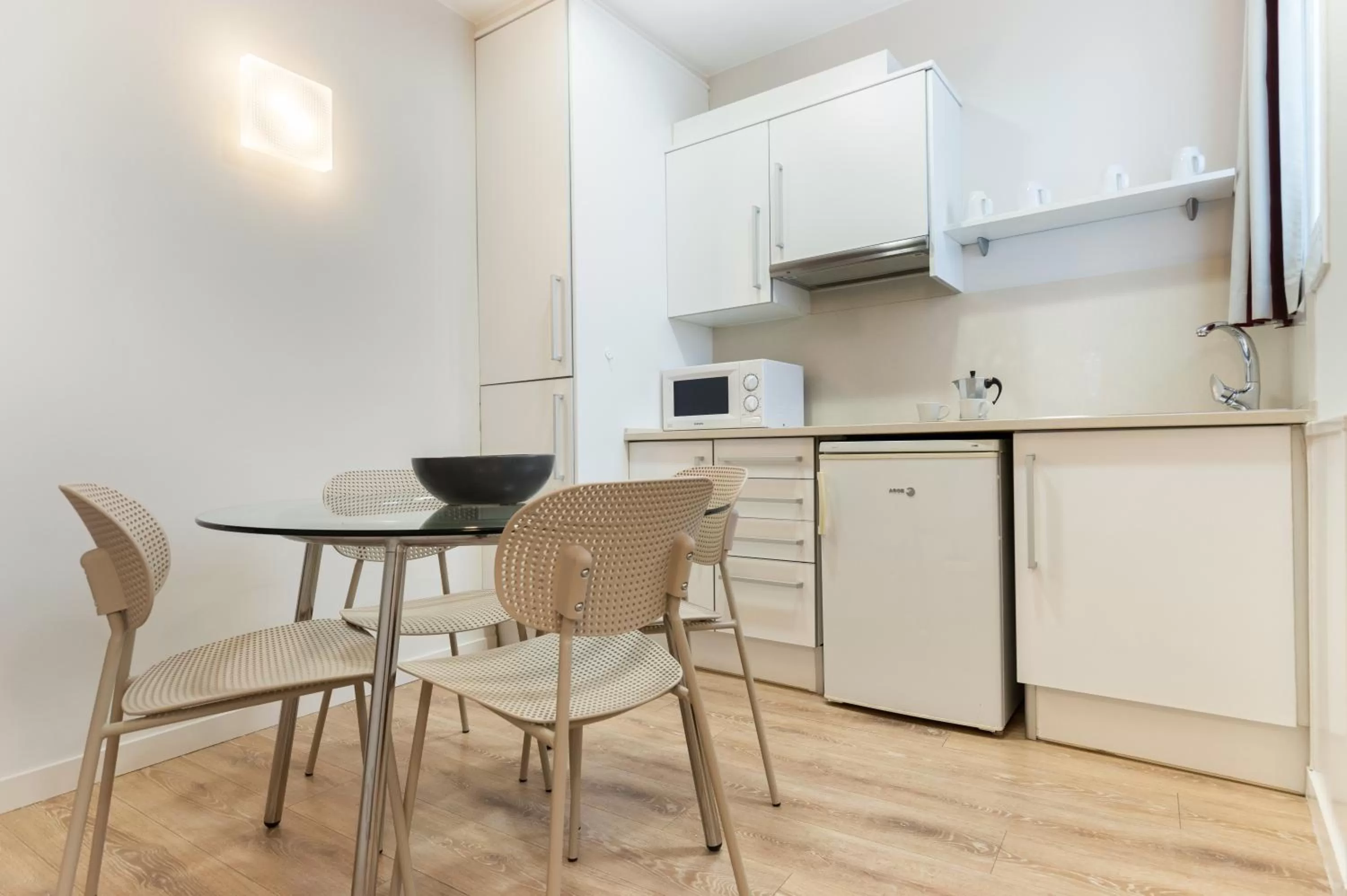 Kitchen or kitchenette in Atica Apartments - by Weflating