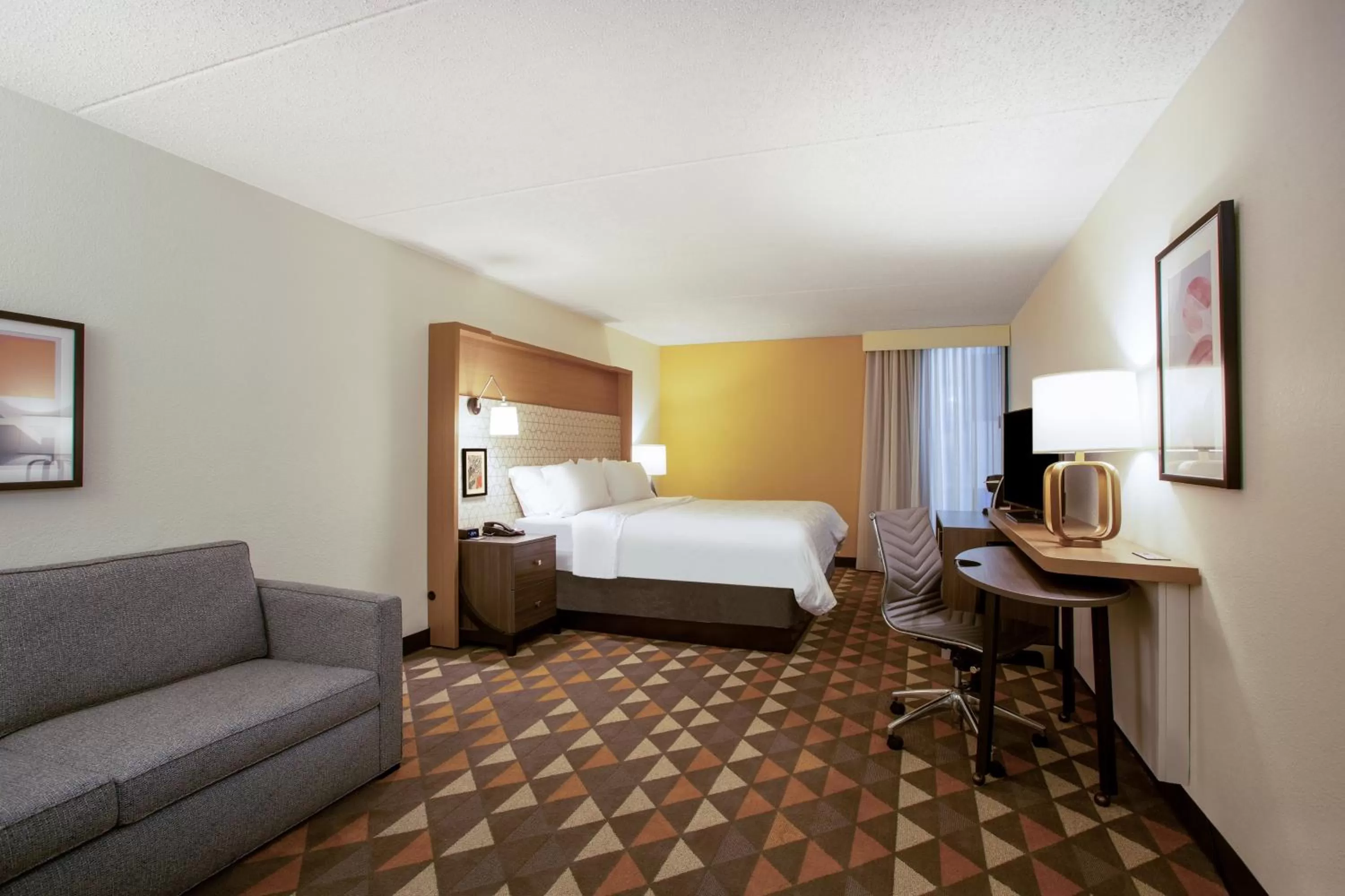 Photo of the whole room, Bed in Holiday Inn Morgantown - Reading Area by IHG