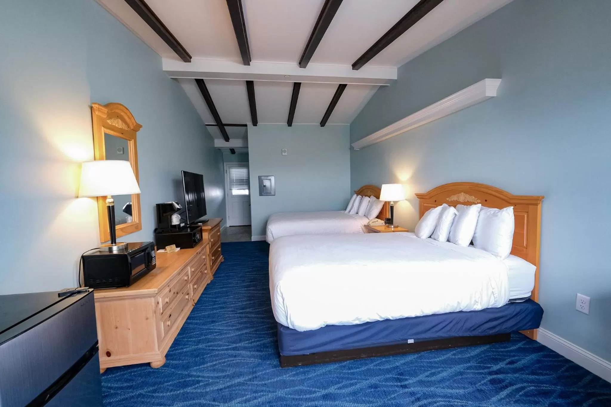 Bed in Norseman Resort on the Beach