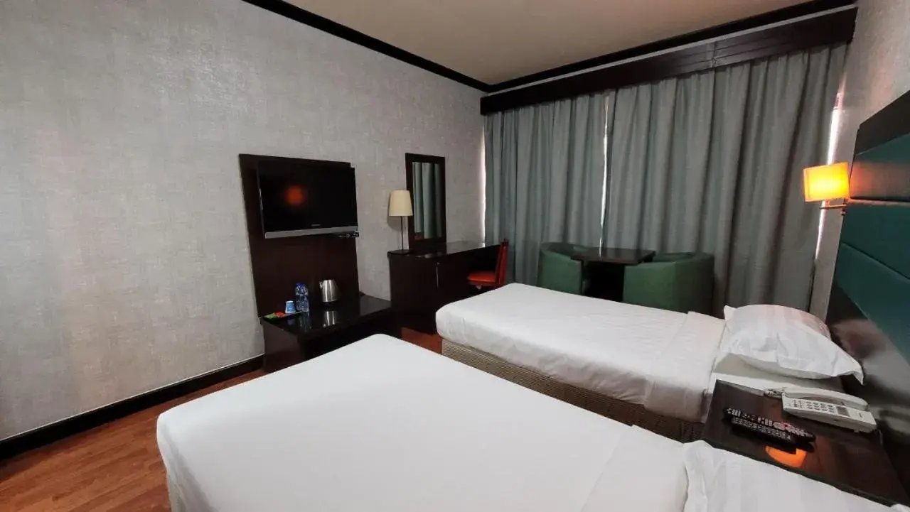 Bed in Strand Hotel