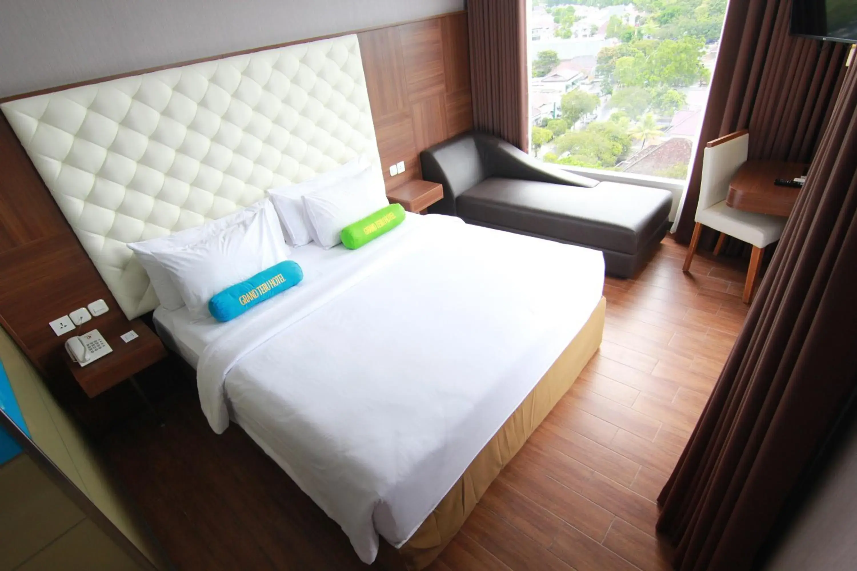 Bed in Grand Tebu Hotel