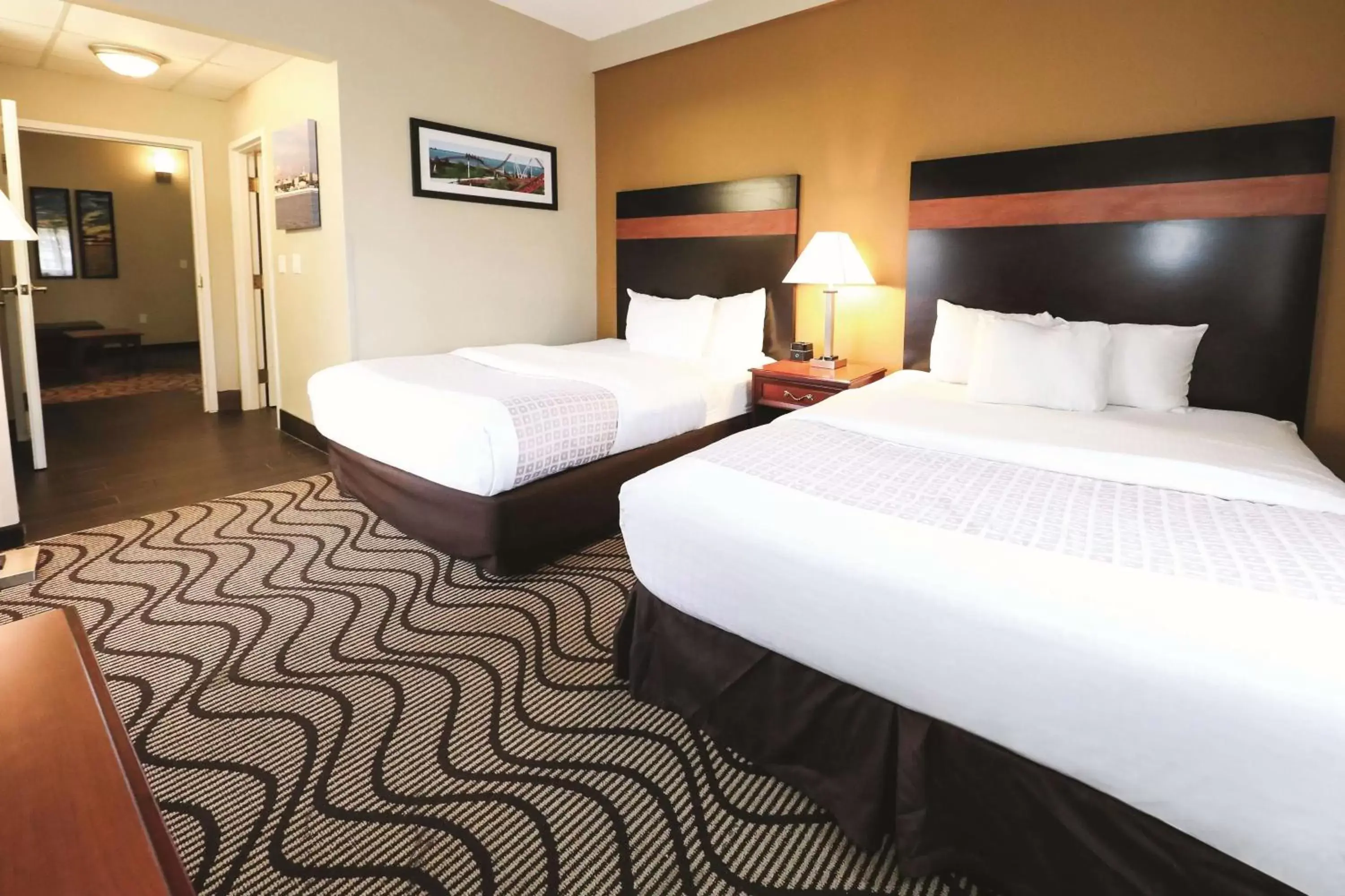 Photo of the whole room, Bed in La Quinta Inn by Wyndham Sandusky near Cedar Point