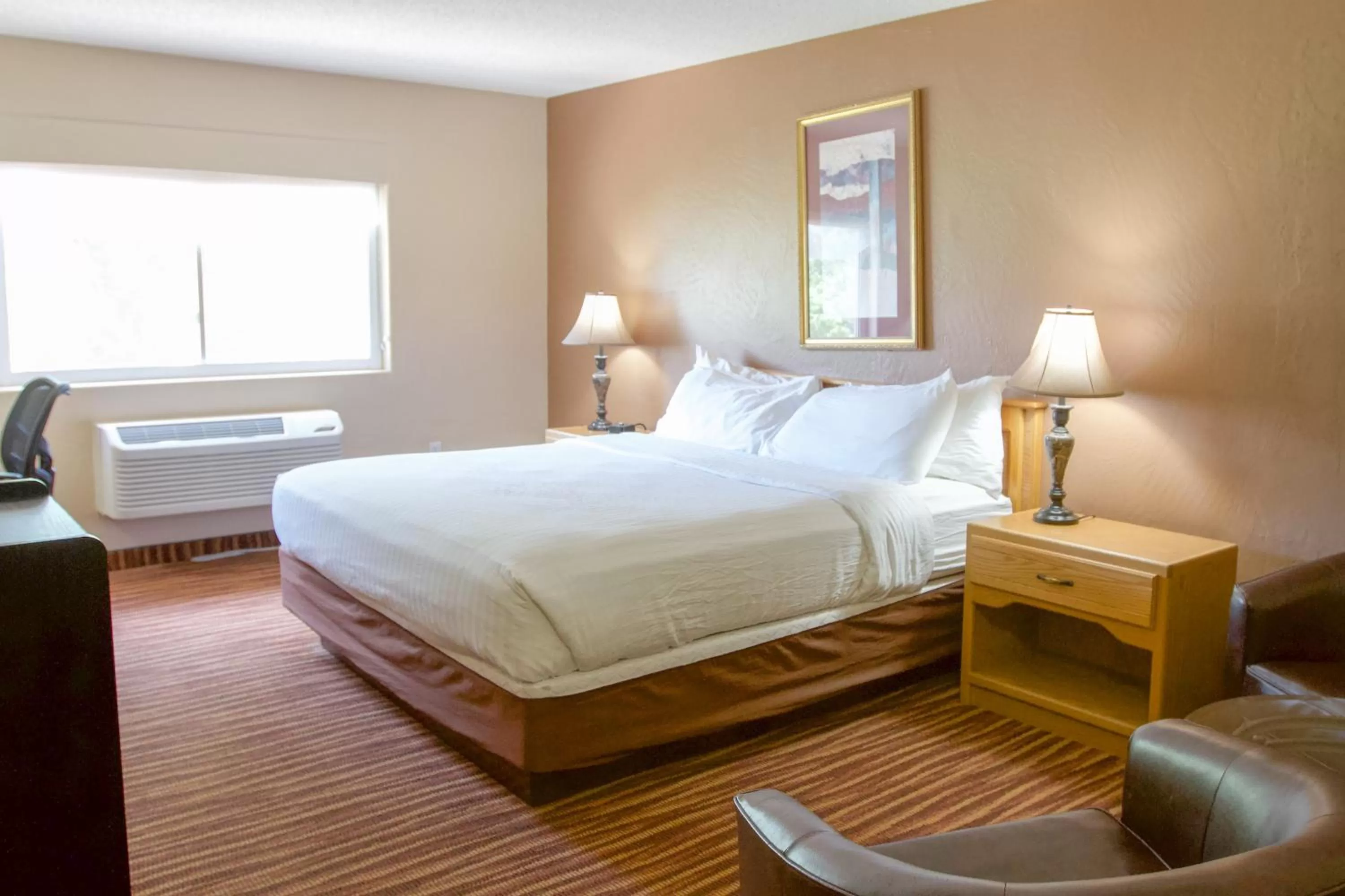 Bed in First Choice Inn at the Swell