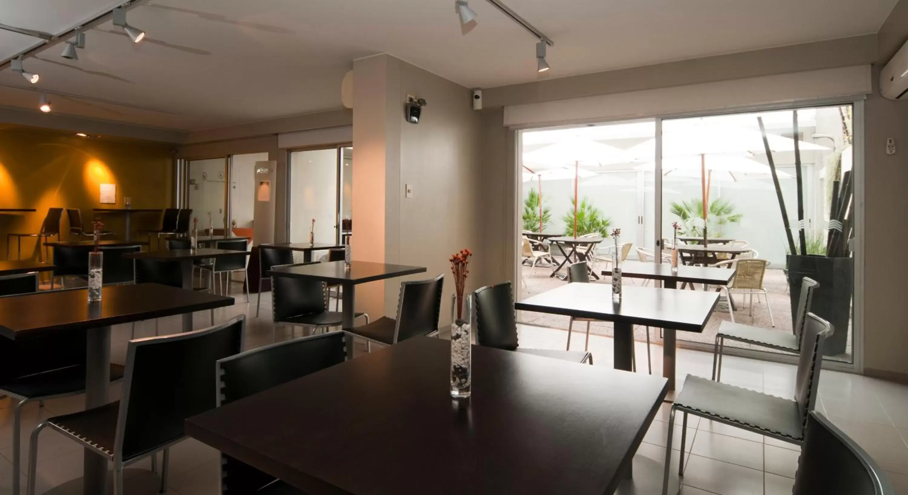 Communal lounge/ TV room, Restaurant/Places to Eat in Punta Trouville Hotel