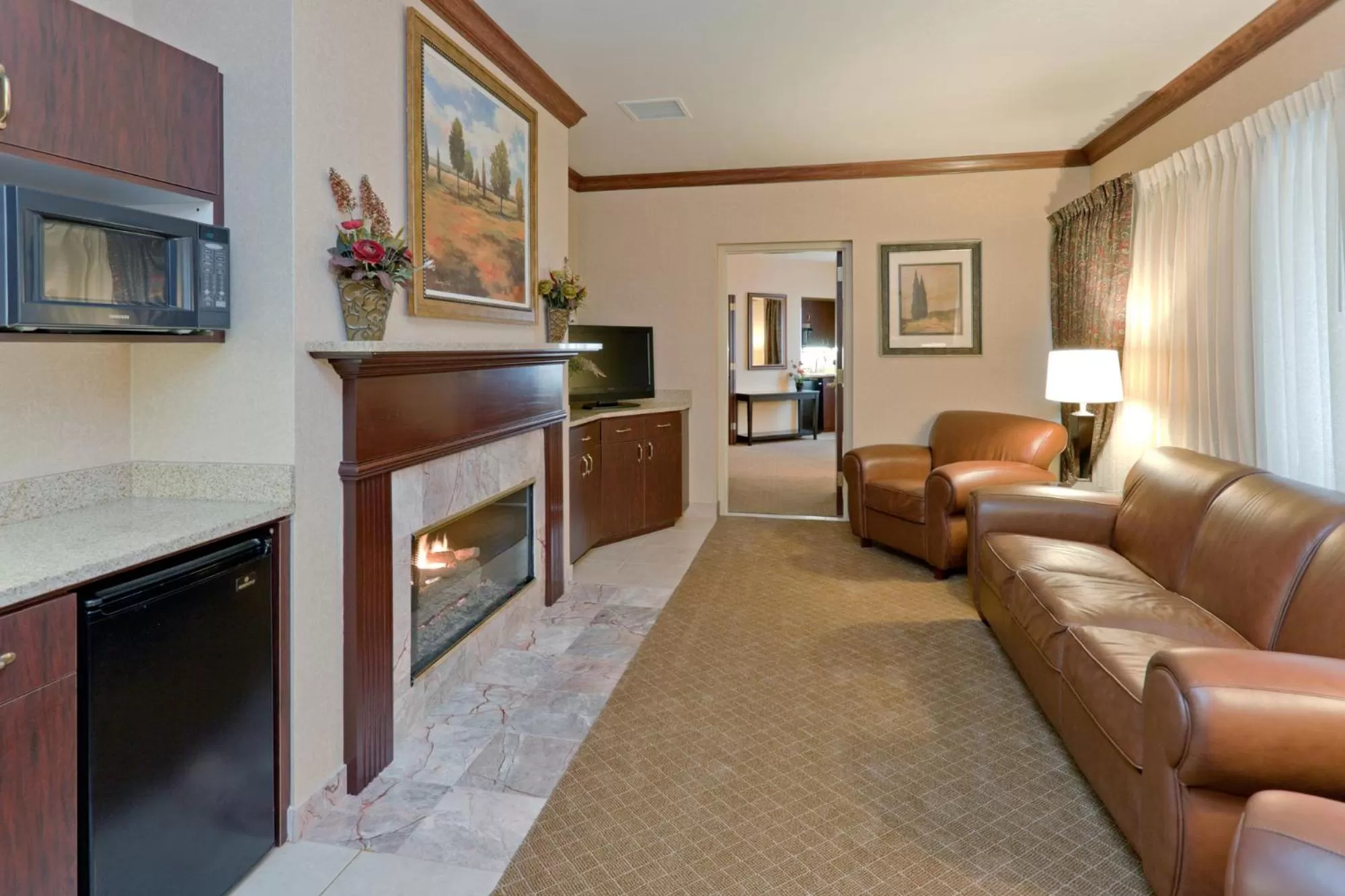 Living room, Seating Area in Wingate by Wyndham Mentor OH