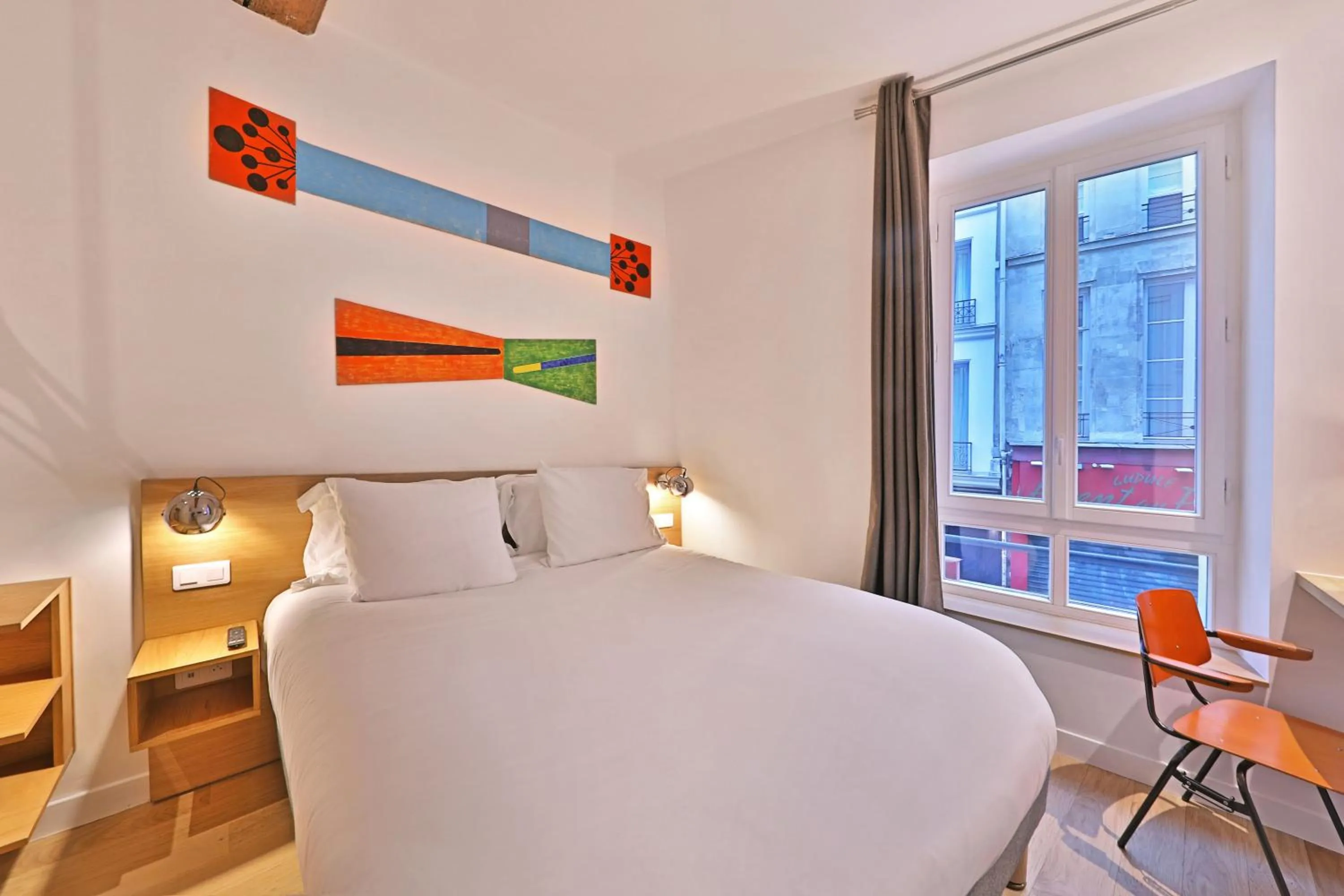 Bed in Hôtel Louvre Richelieu