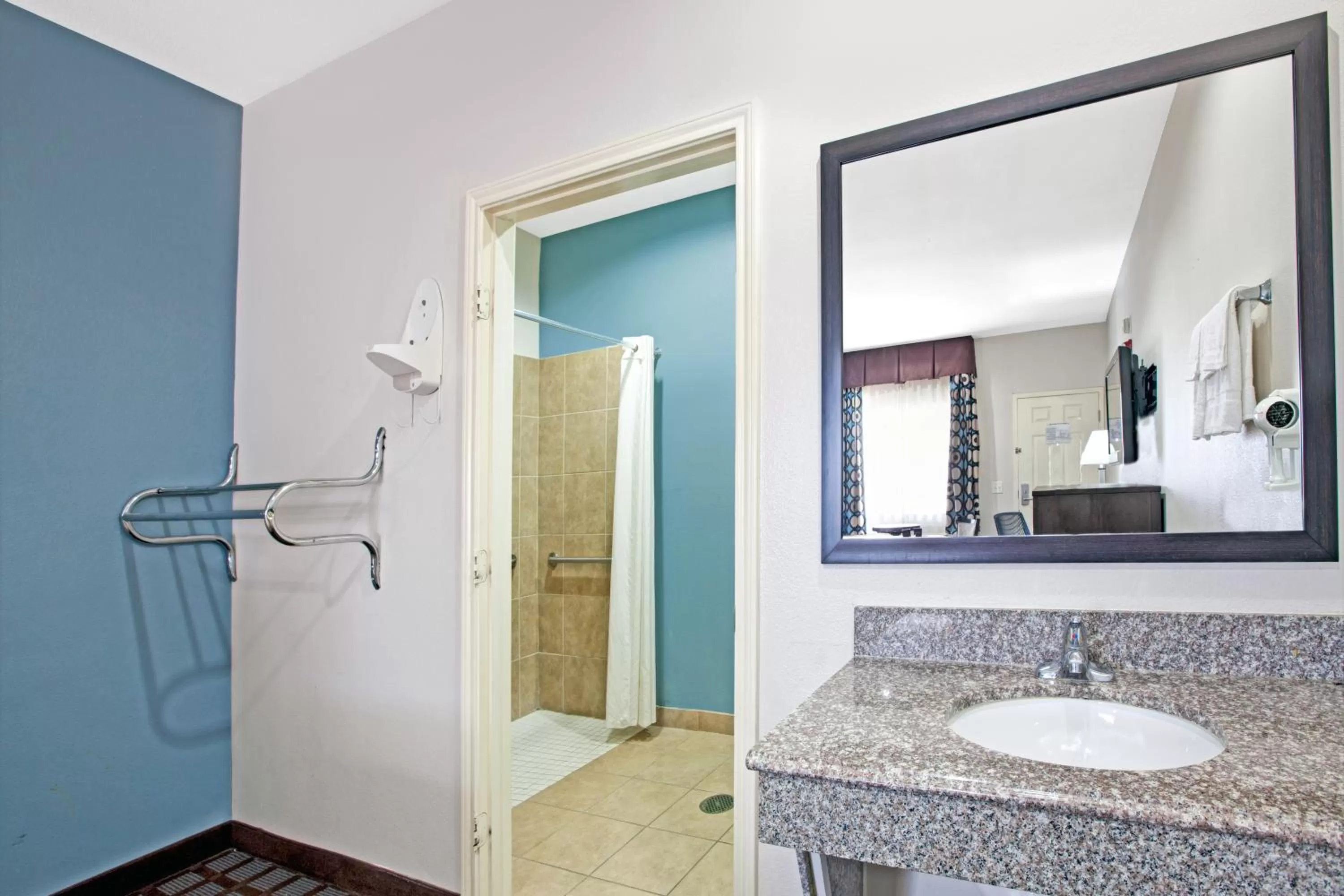 Bathroom in Super 8 by Wyndham Houston North I-45