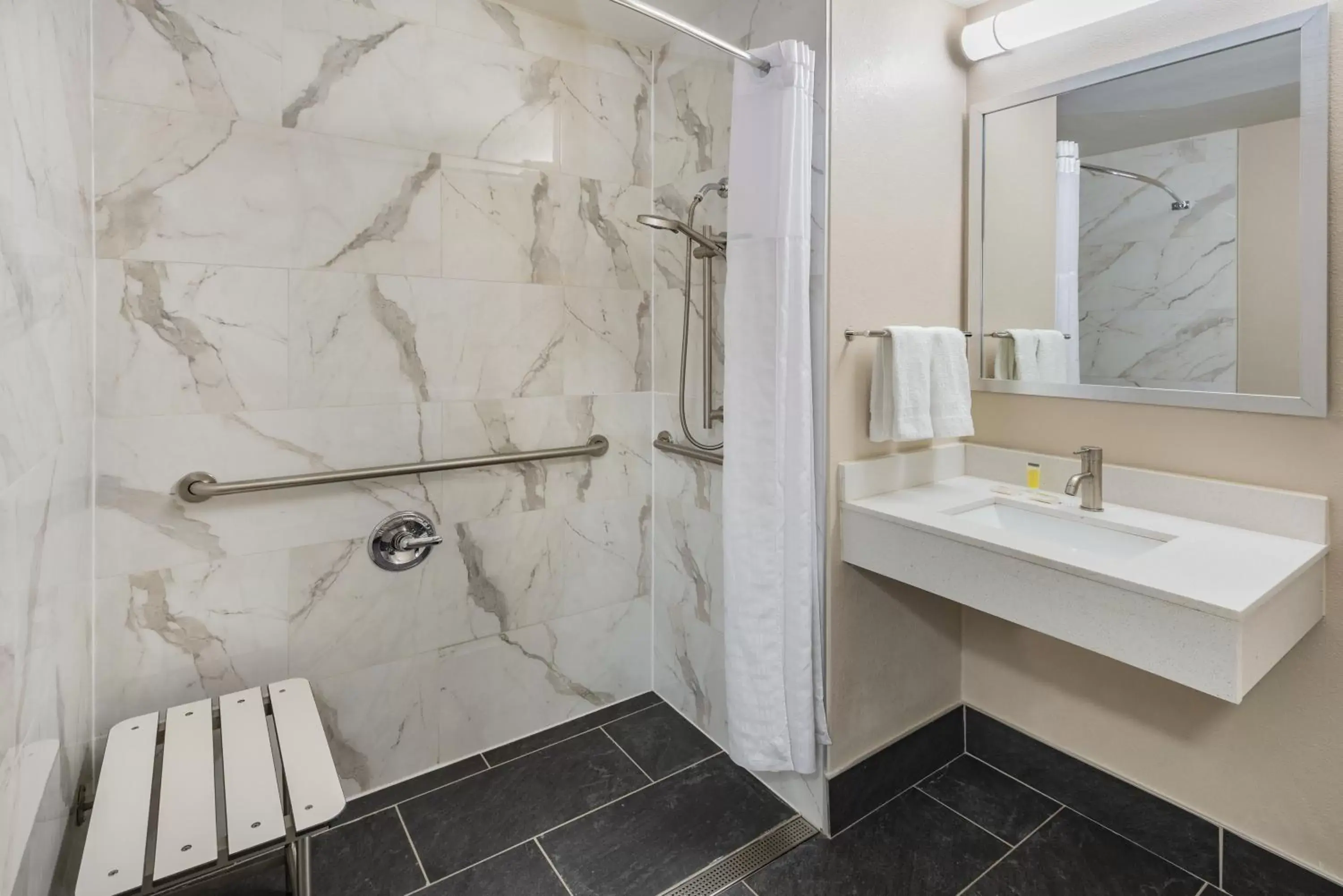Shower, Bathroom in Super 8 by Wyndham Charlottesville