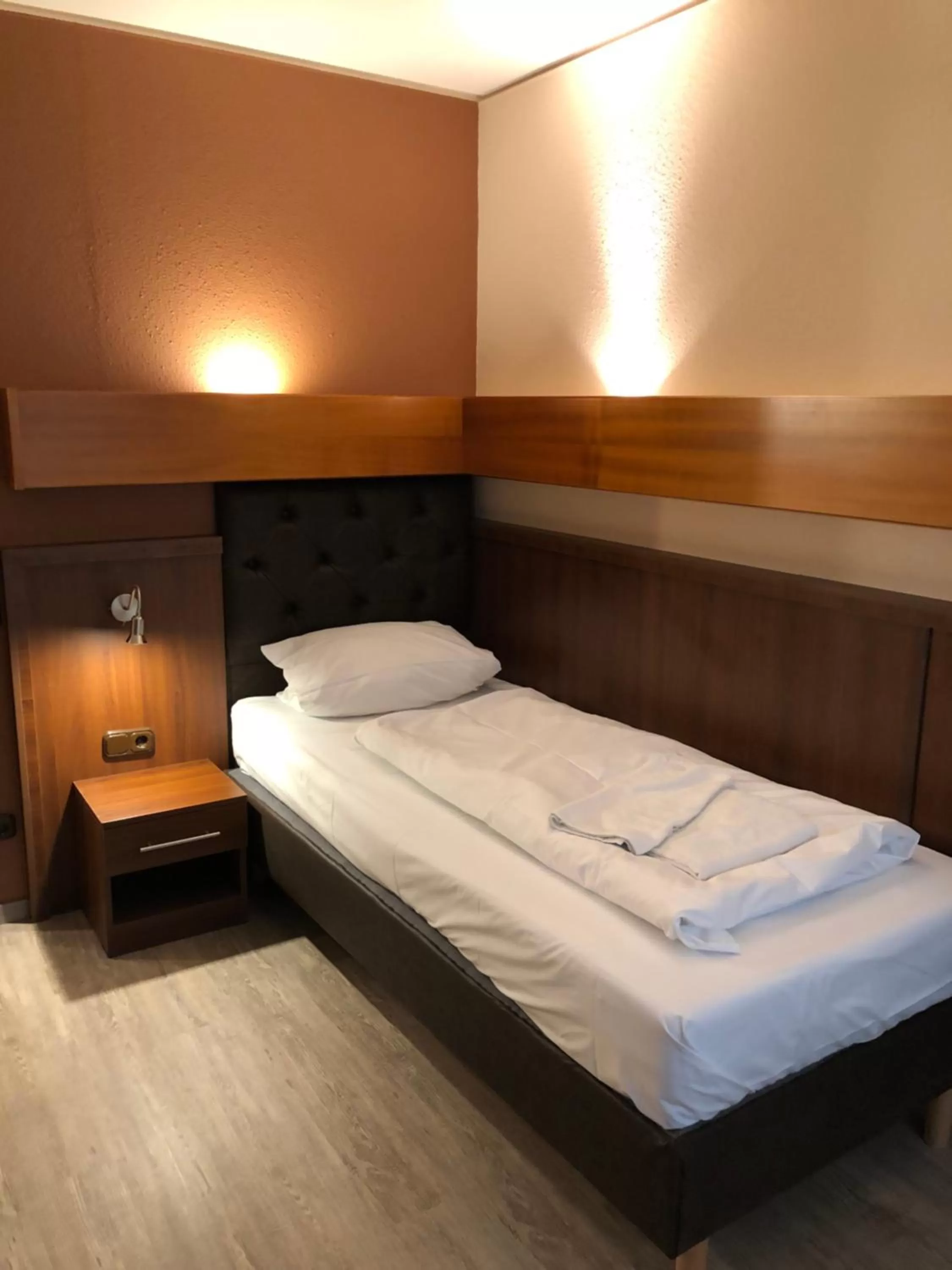 Bed in Hotel Poseidon