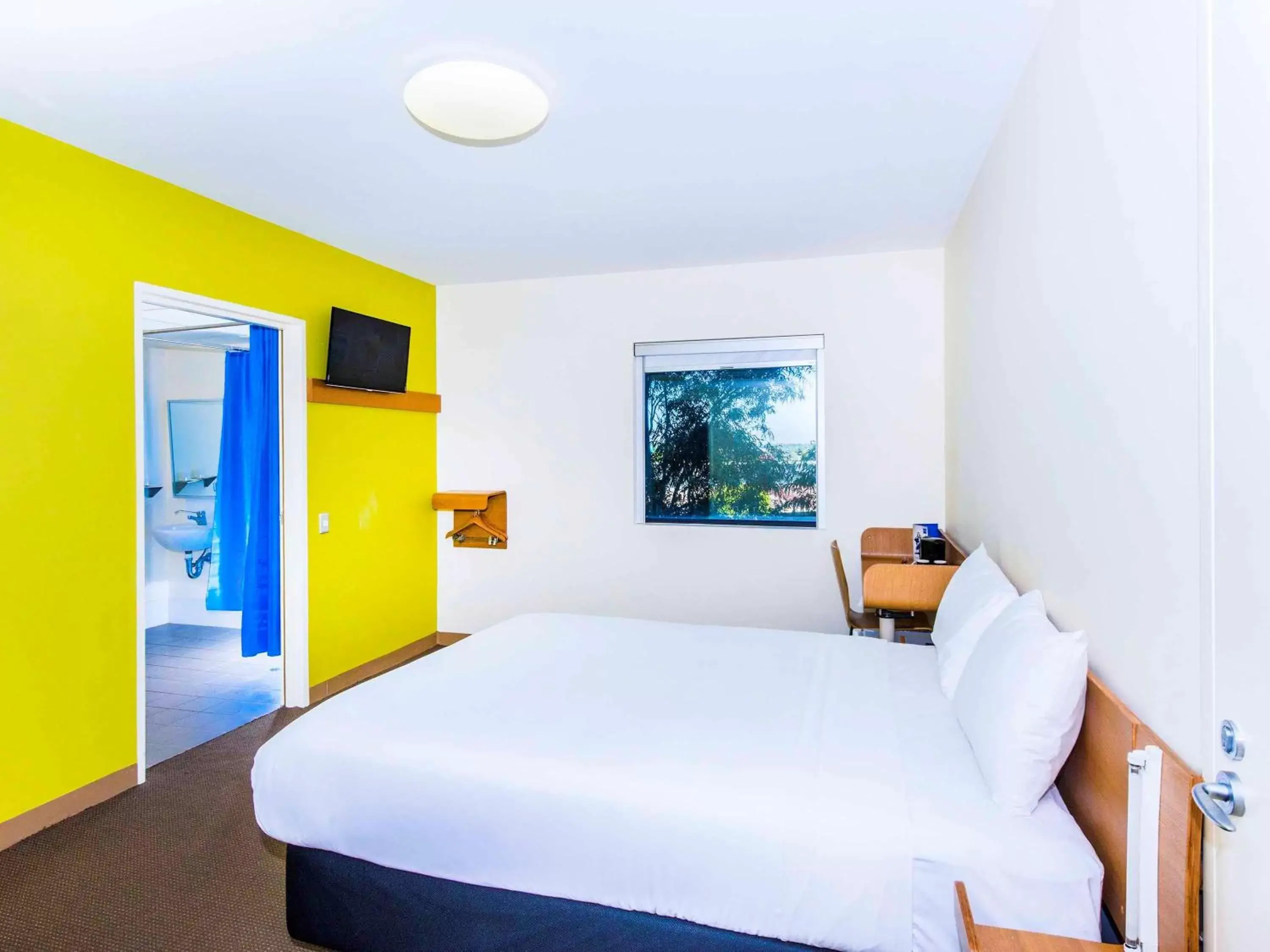 Photo of the whole room, Bed in ibis Budget Sydney Olympic Park