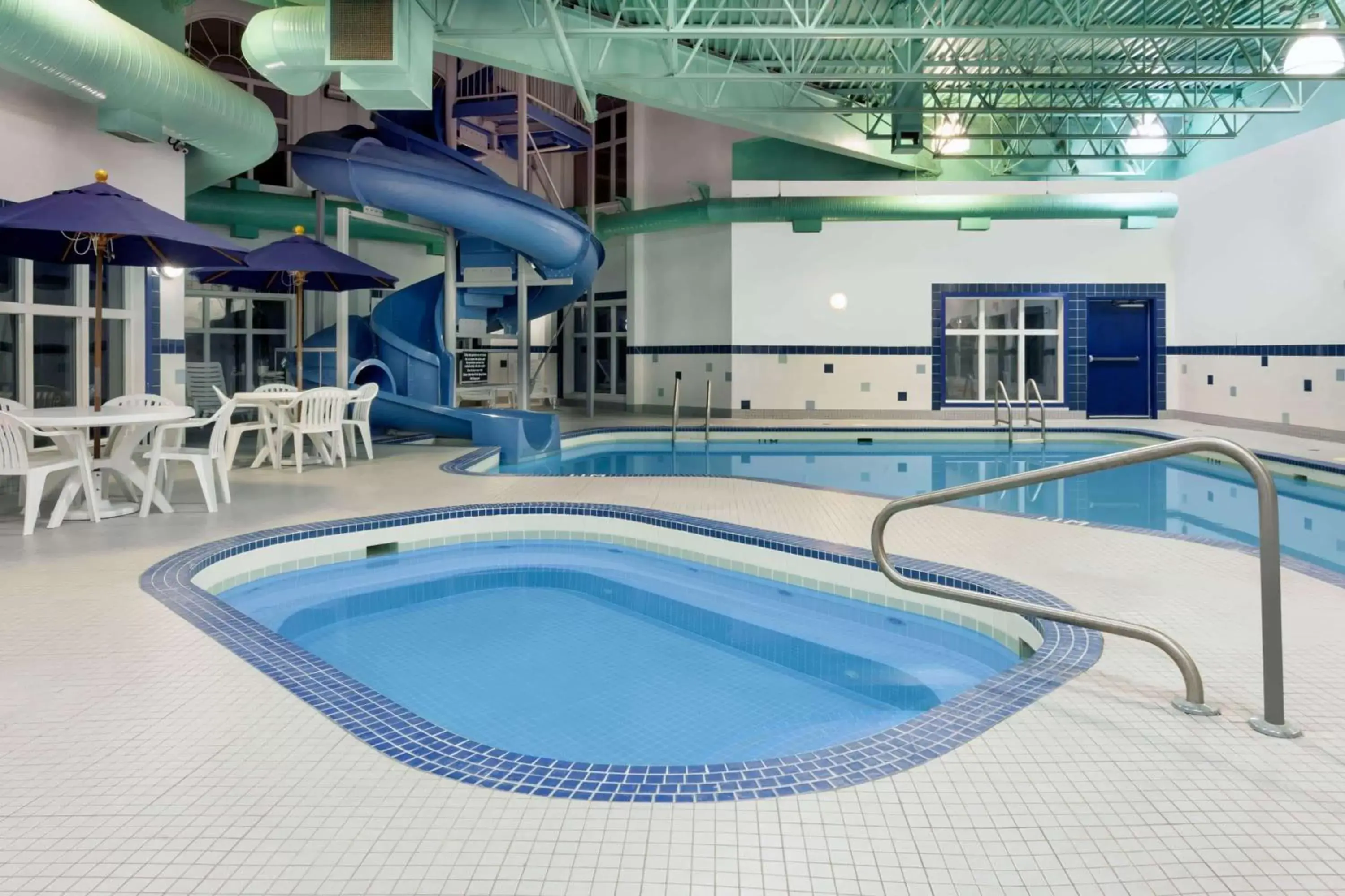 Hot Tub, Swimming Pool in Ramada by Wyndham Weyburn