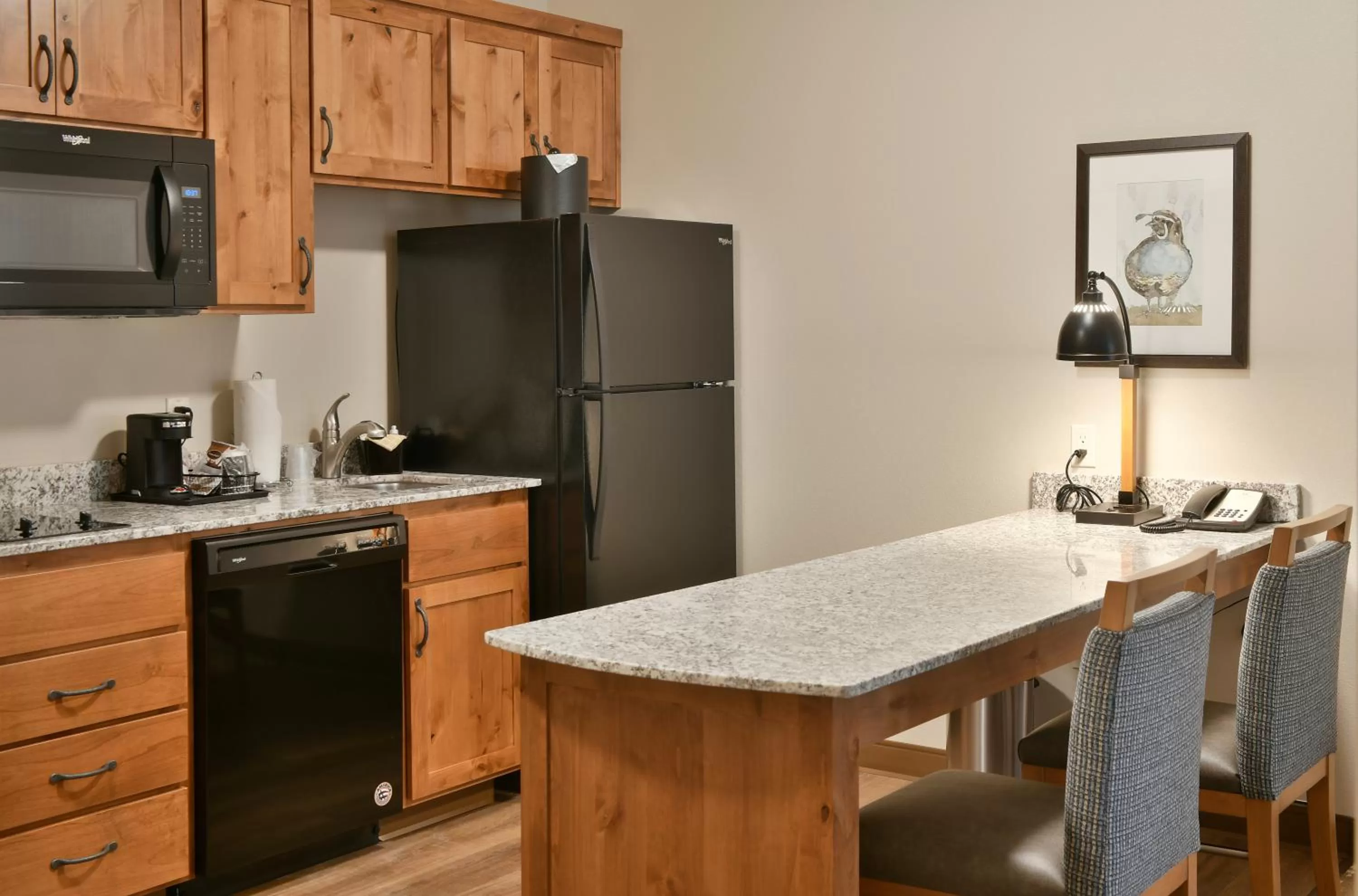 Kitchen or kitchenette in GrandStay Hotel & Suites
