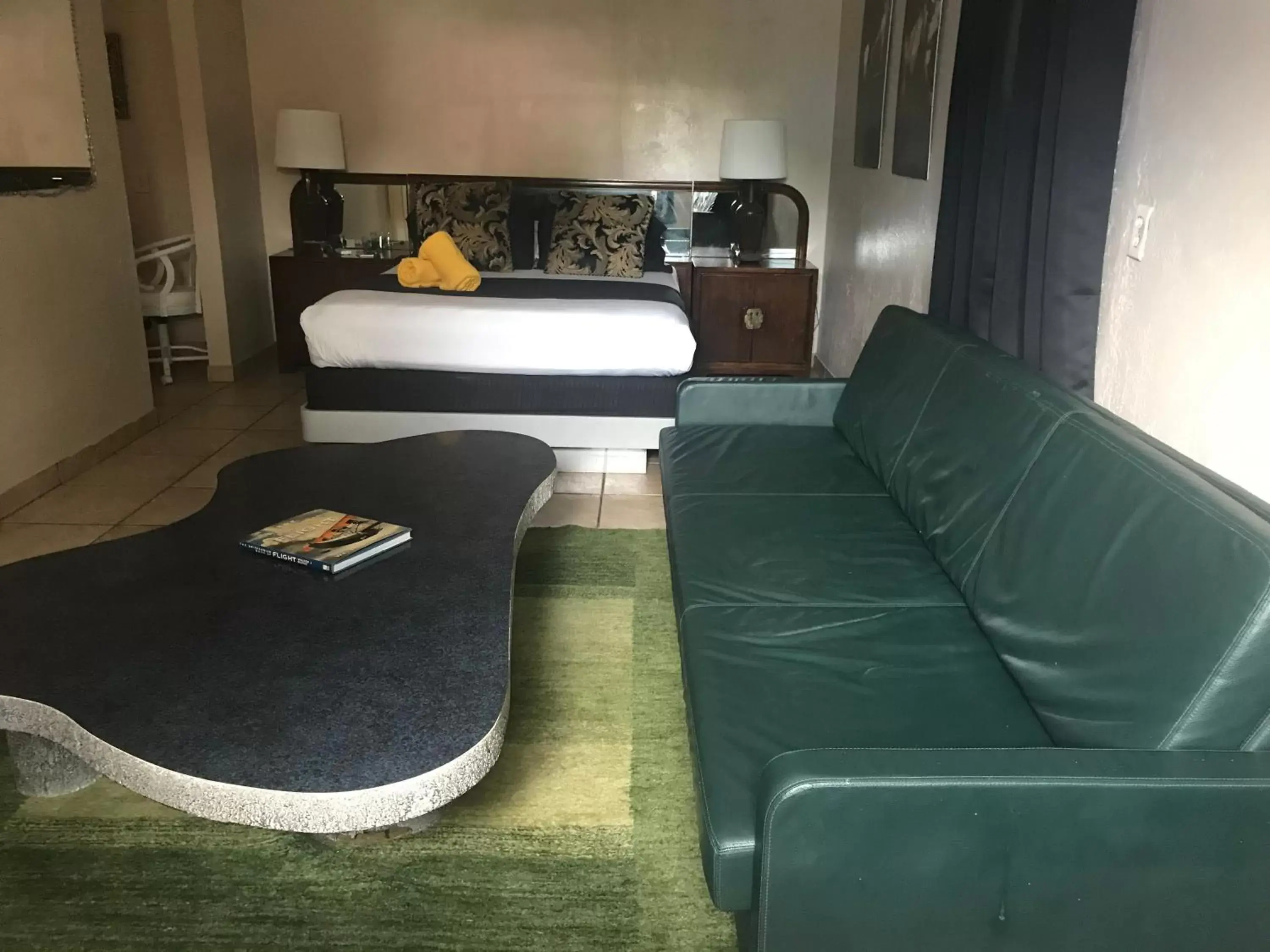 Seating area, Bed in INN LEATHER GUEST HOUSE-GAY MALE ONLY