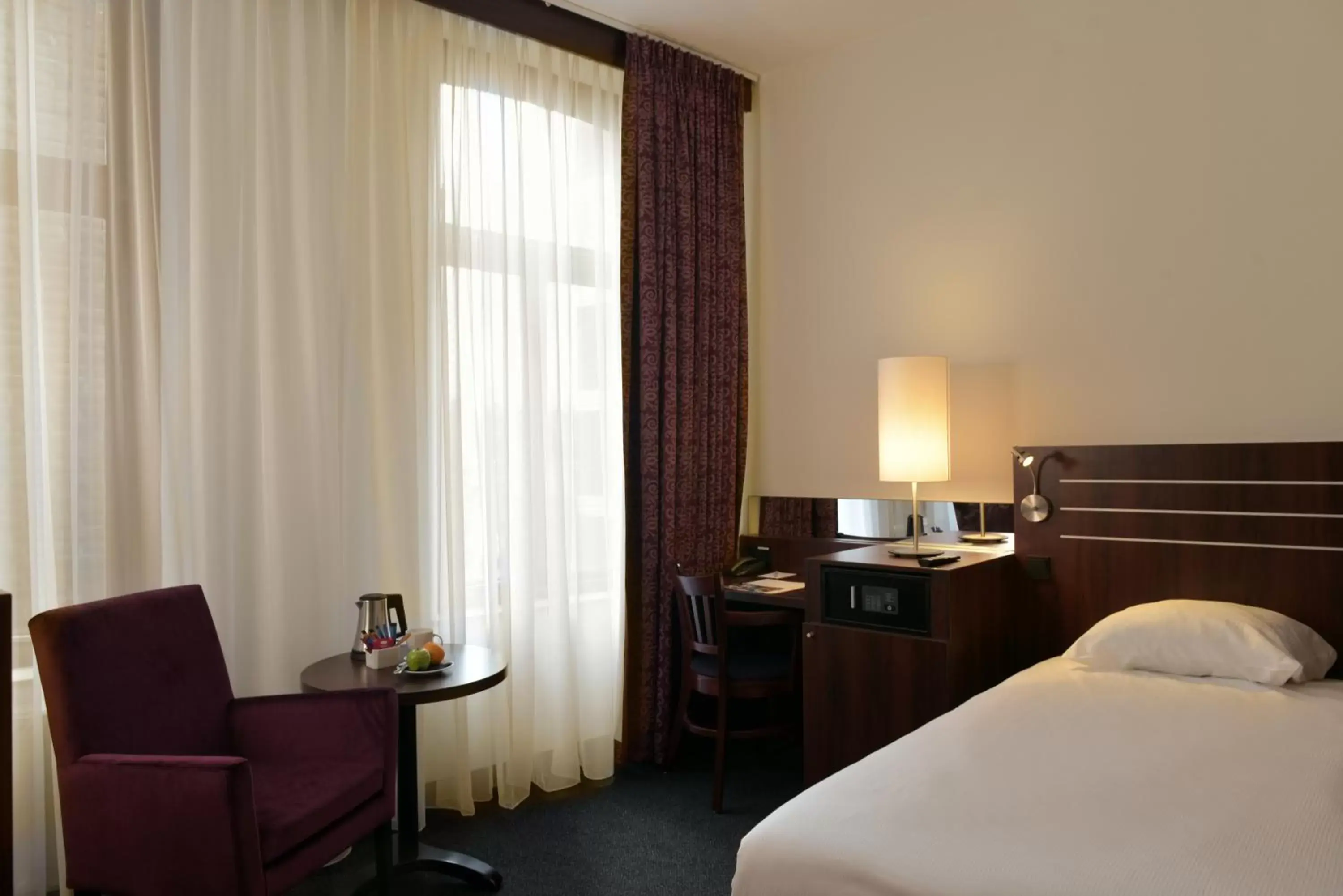 Bed in Amrâth Grand Hotel de l’Empereur