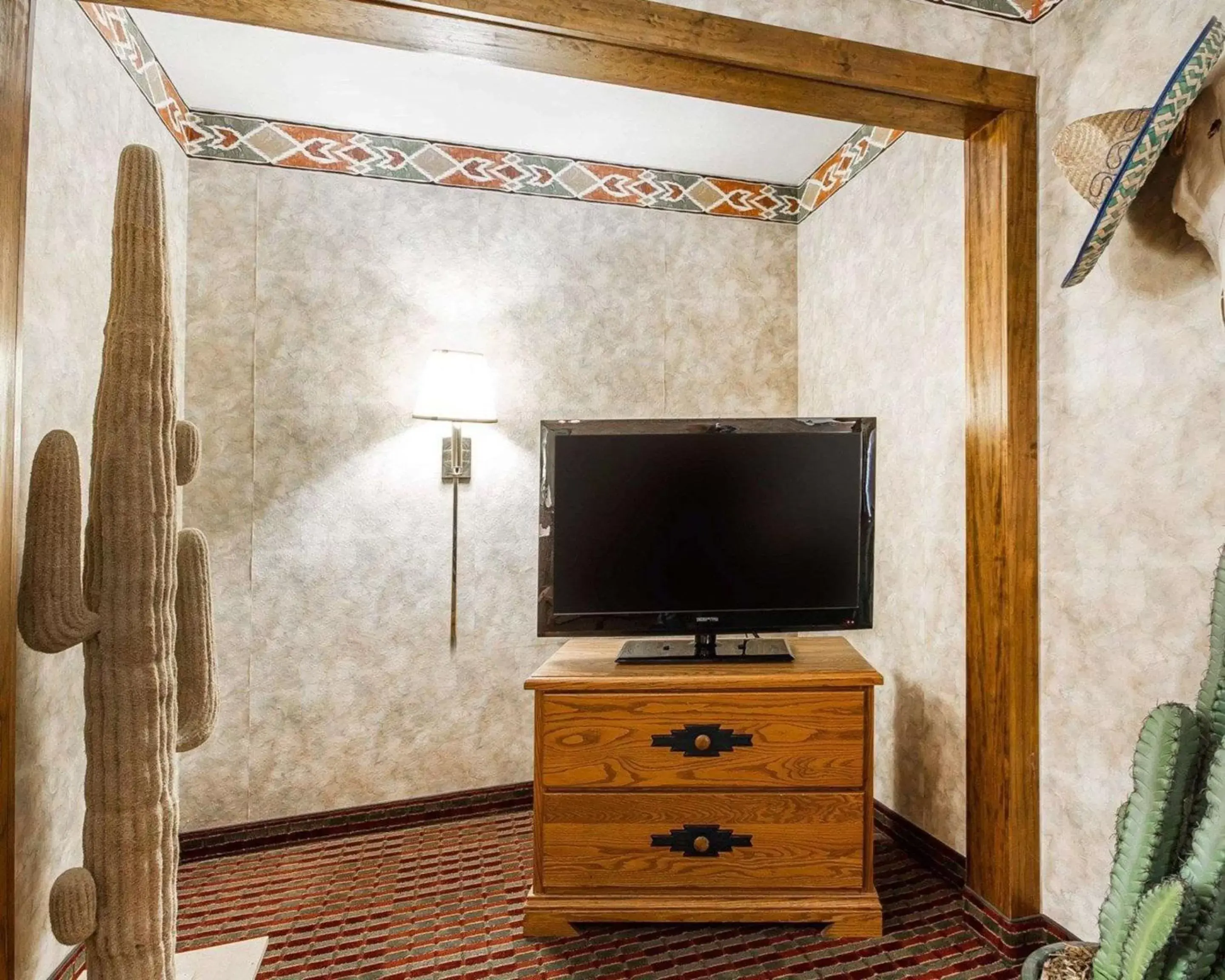 Photo of the whole room, TV/Entertainment Center in Rodeway Inn & Suites Madison East