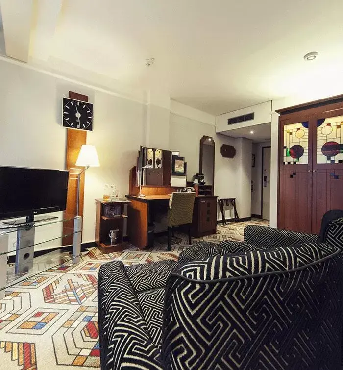 TV/Entertainment Center in Banks Mansion - All Inclusive Boutique Hotel