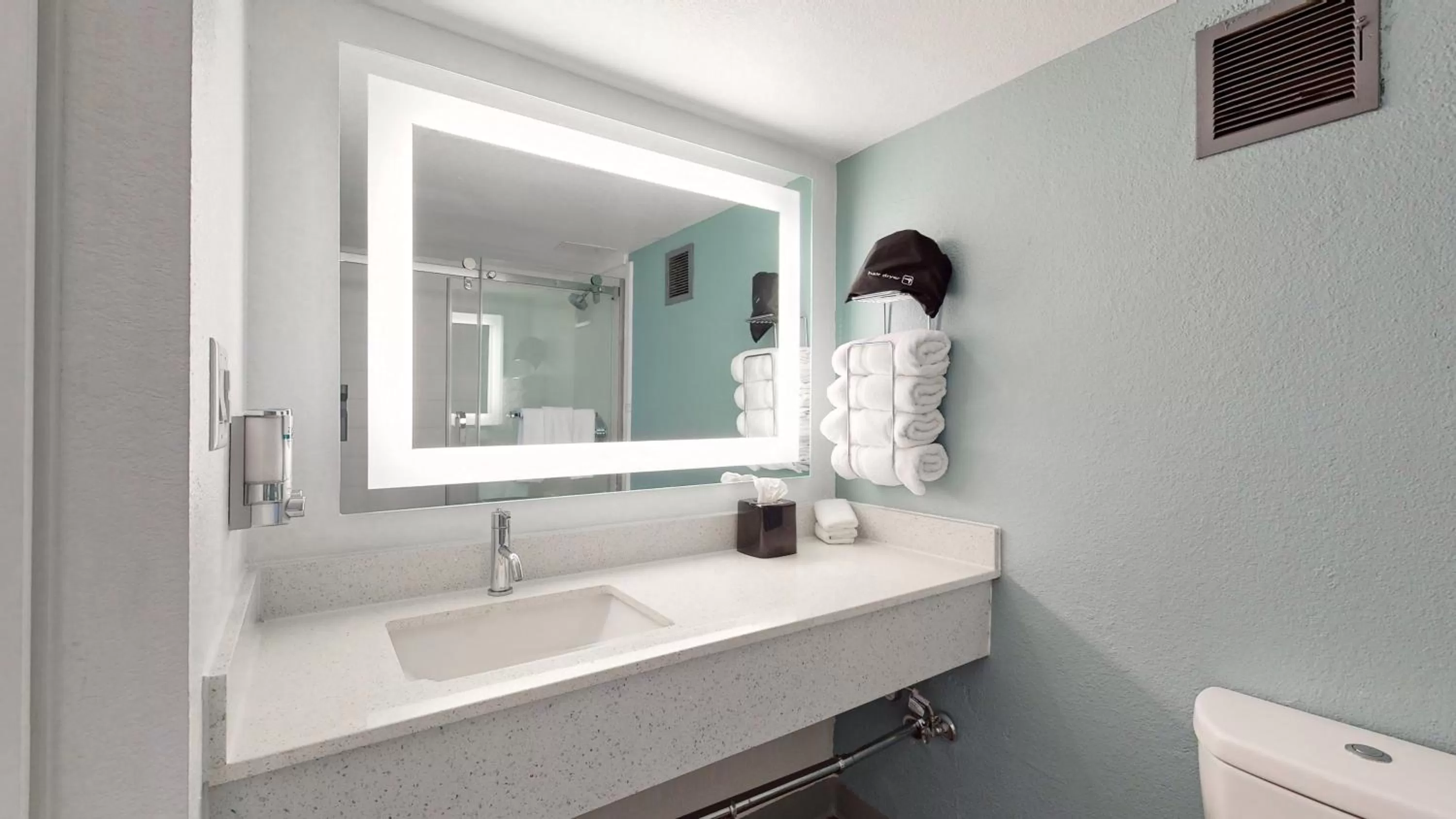 Bathroom in voco College Station Aggieland by IHG