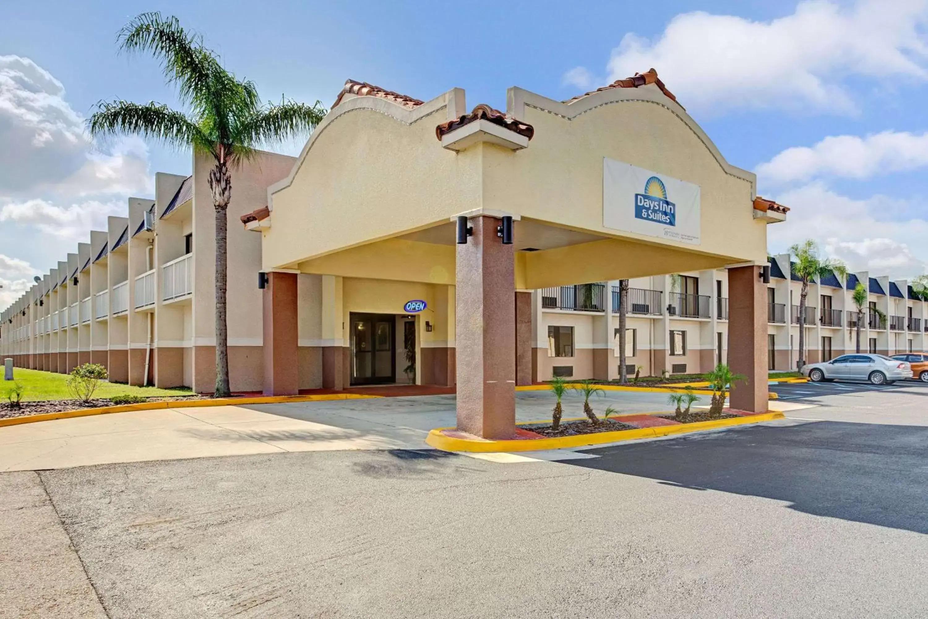 Property building in Days Inn & Suites by Wyndham Tampa near Ybor City