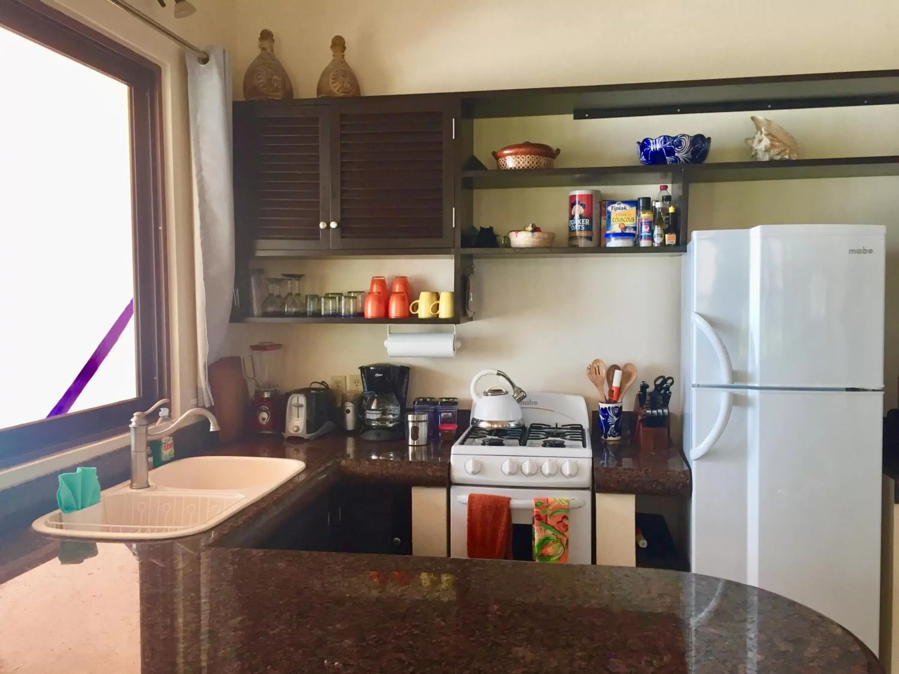 Kitchen/Kitchenette in Nah Uxibal Villa and Casitas