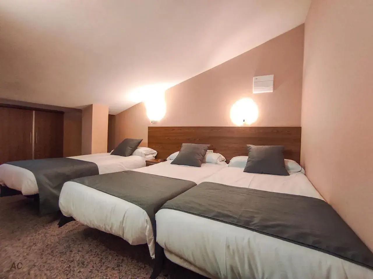 Economy Quadruple Room with Fan in Hotel Arcos Catedral