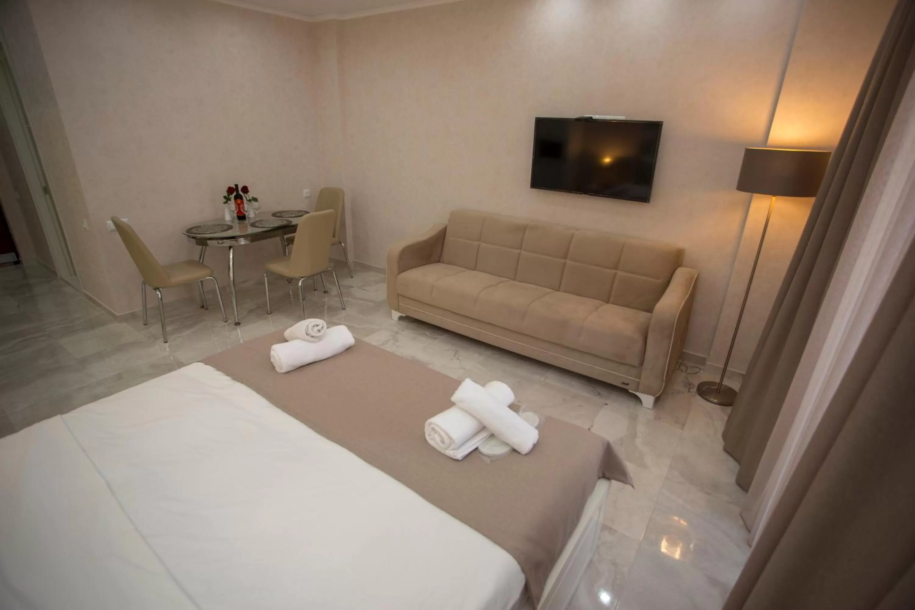 Seating area, Bed in Blue Star Batumi