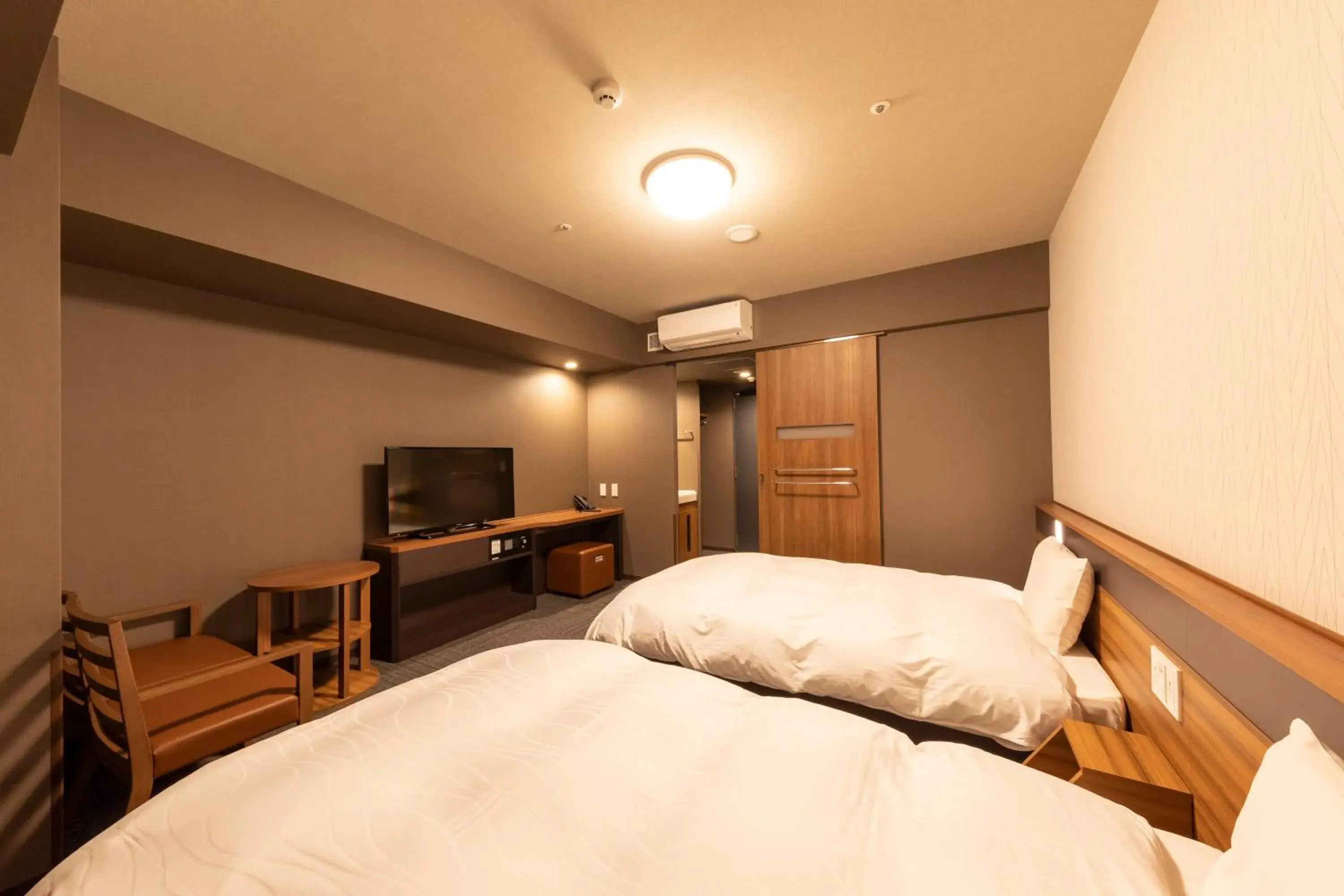 Bed in Dormy Inn Kawasaki Natural Hot Spring